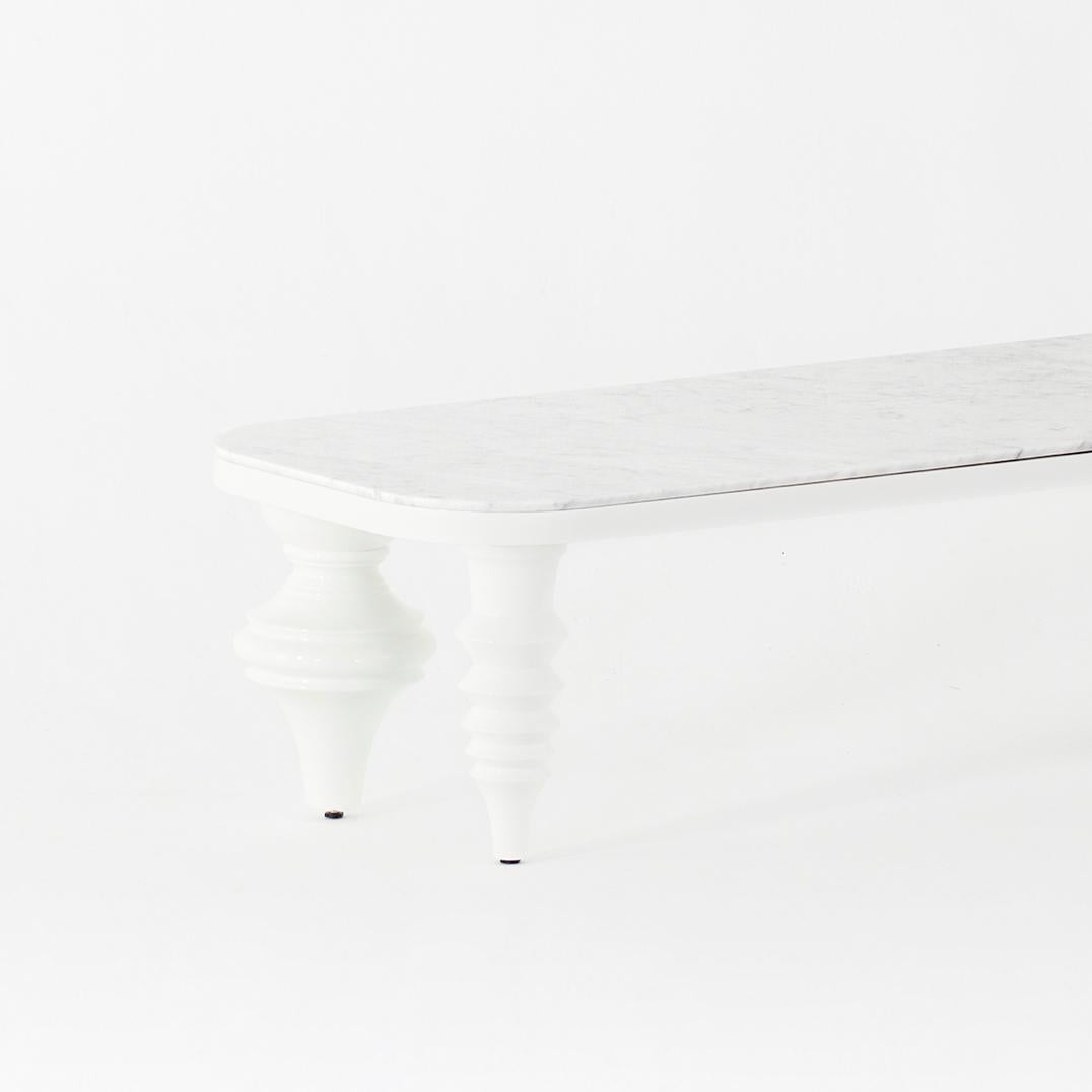 Low table designed by Jaime Hayon manufactured by BD Barcelona

MDF base and legs in turned solid alder wood, lacquered in white gloss

Measures: 50 x 150 x H. 35 cm.