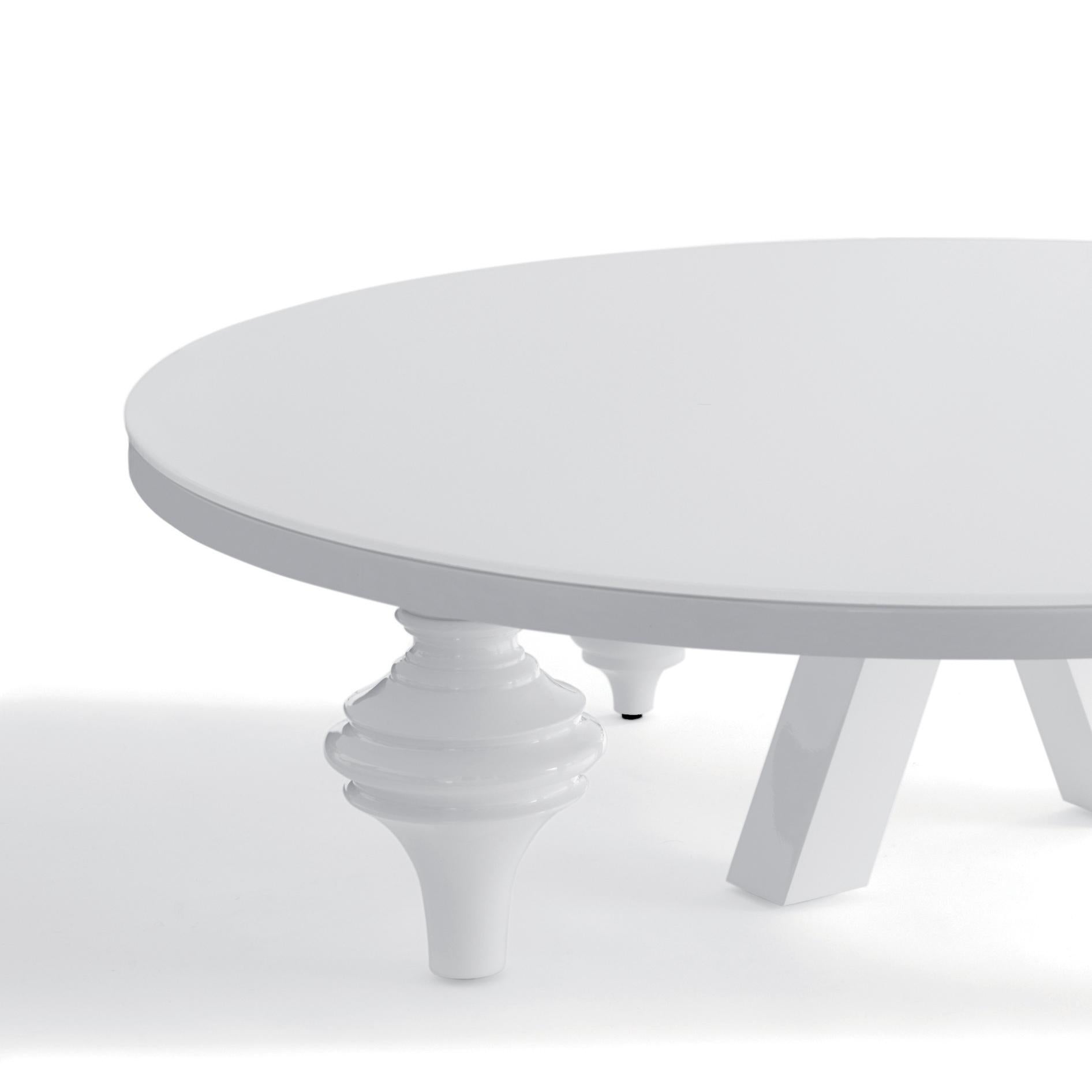 Low table designed by Jaime Hayon.
Manufactured by BD Barcelona Design.

MDF base and legs in turned solid alder wood, lacquered in white 

Rounded table measures:
Ø 80/120 x H. 35 cm.