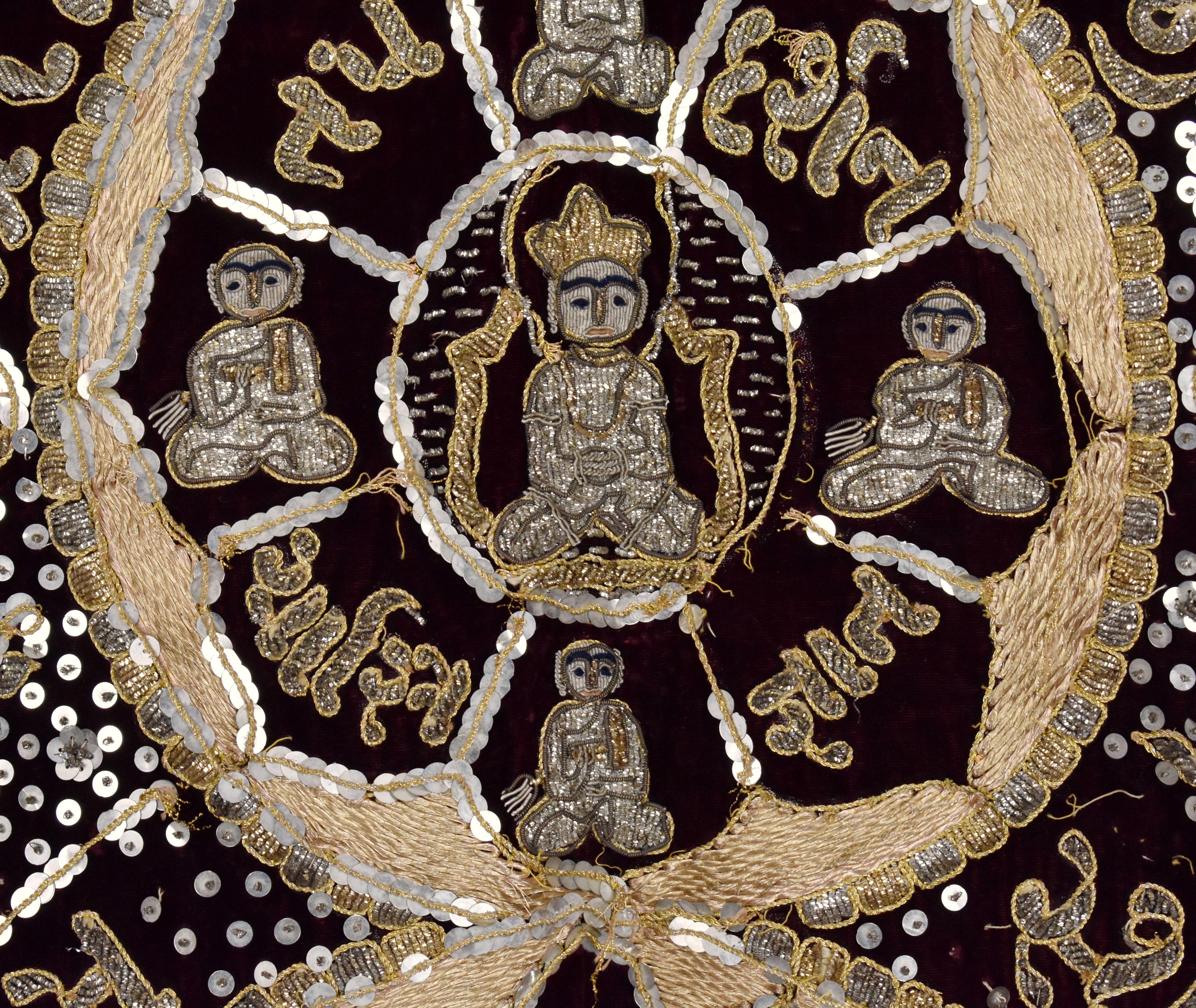 Jain Temple Hanging (chor or puthiya) these were made or commissioned by families to be given to the local Jain Temple.
 Silver and gold stumpwork with sequins on a rich deep red velvet cloth, 
This piece has been made to hang in an alcove in the
