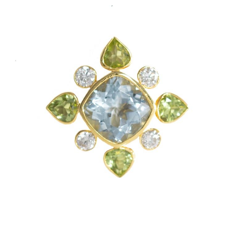 18 Yellow Carat Gold Diamond, Aquamarine & Peridot Earrings.

Esther Eyre has been designing and making precious jewellery for over twenty years. She trained at Kingston and Middlesex gaining a BA in jewellery design in 1982. Esther worked briefly