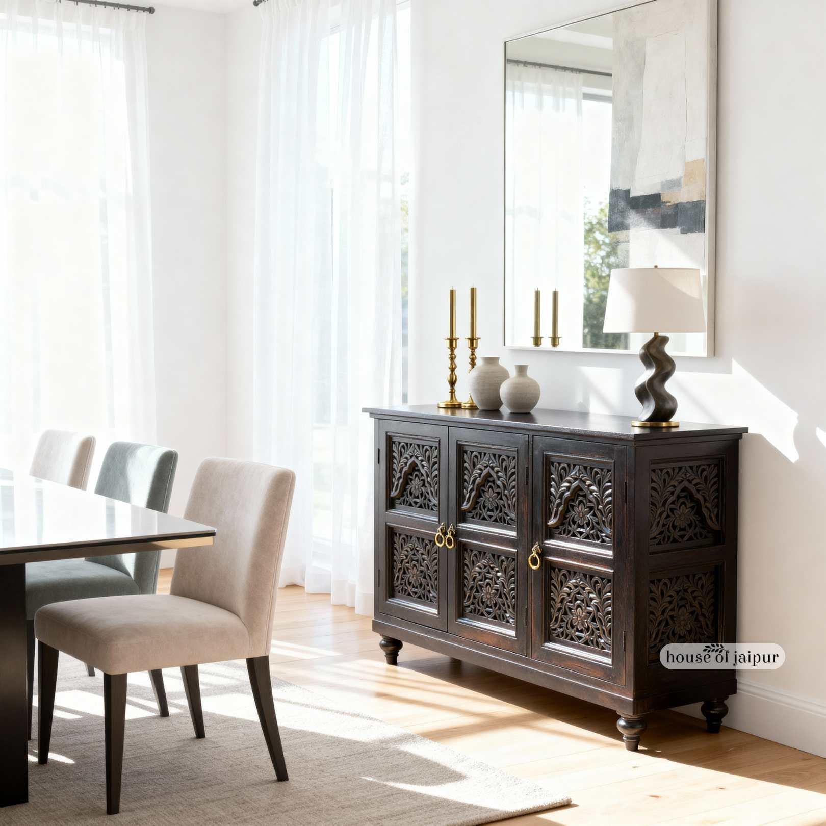 The Jaipur Hand-Carved Lattice Sideboard celebrates the timeless art of woodcarving, blending intricate craftsmanship with functional elegance.

Handcrafted from solid mango wood and finished in a deep antique dark brown polish, this cabinet