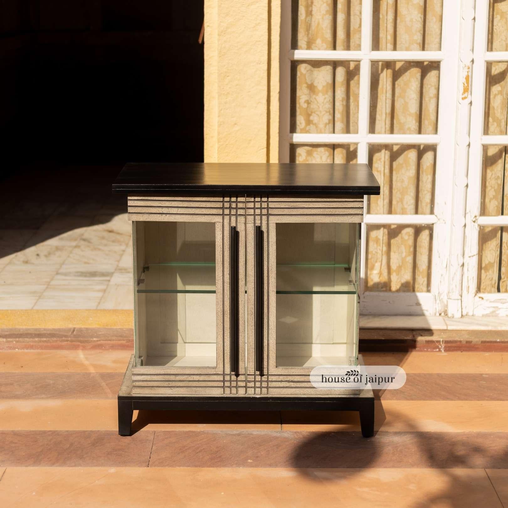 The Jaipur Distressed Linea Cabinet from our Linea Collection brings together timeless craftsmanship and modern geometry with a beautifully aged finish.

Handcrafted from solid wood, this cabinet features a distressed grey body contrasted with