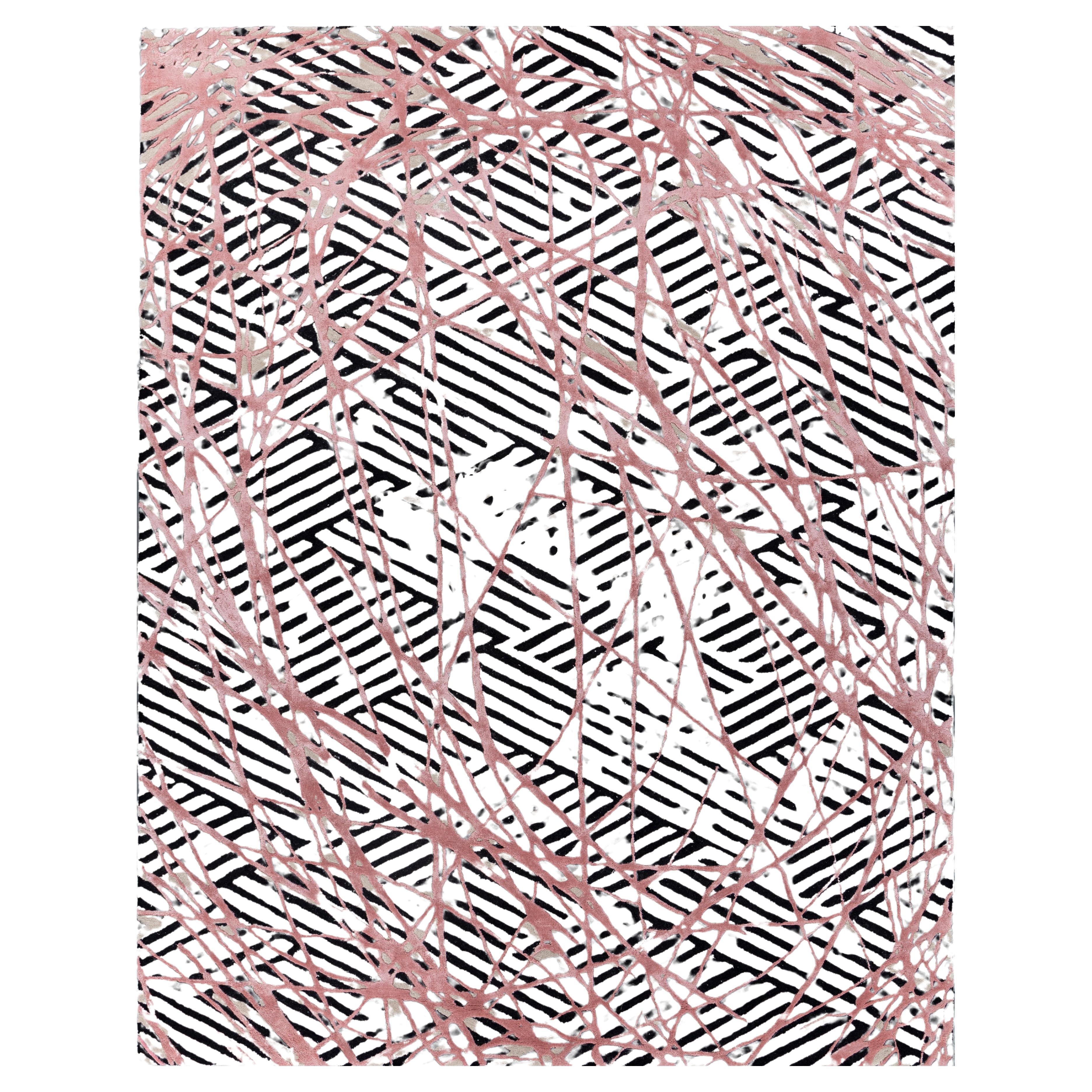 Jaipur Rugs La collezione Adrift è un'audace esplorazione dei contrasti, in cui i sorprendenti disegni in bianco e nero costituiscono la base di ogni pezzo. Questi elementi monocromatici creano una dichiarazione forte e senza tempo, mentre i vivaci