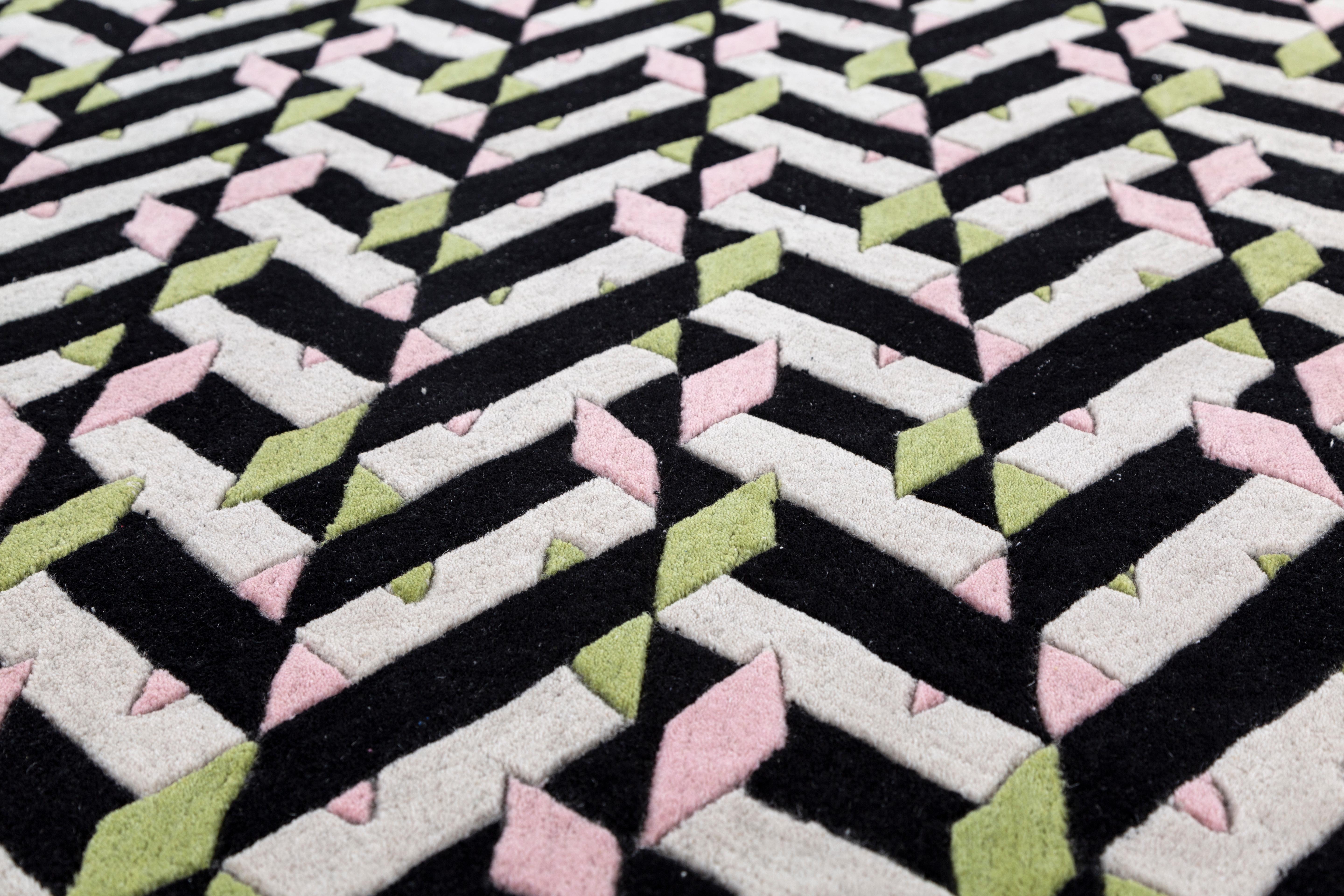 Jaipur Rugs Die Adrift Collection ist eine kühne Erkundung der Kontraste, bei der auffällige Schwarz-Weiß-Muster die Grundlage für jedes Stück bilden. Diese monochromen Elemente sorgen für eine starke, zeitlose Aussage, während kräftige Farbtupfer