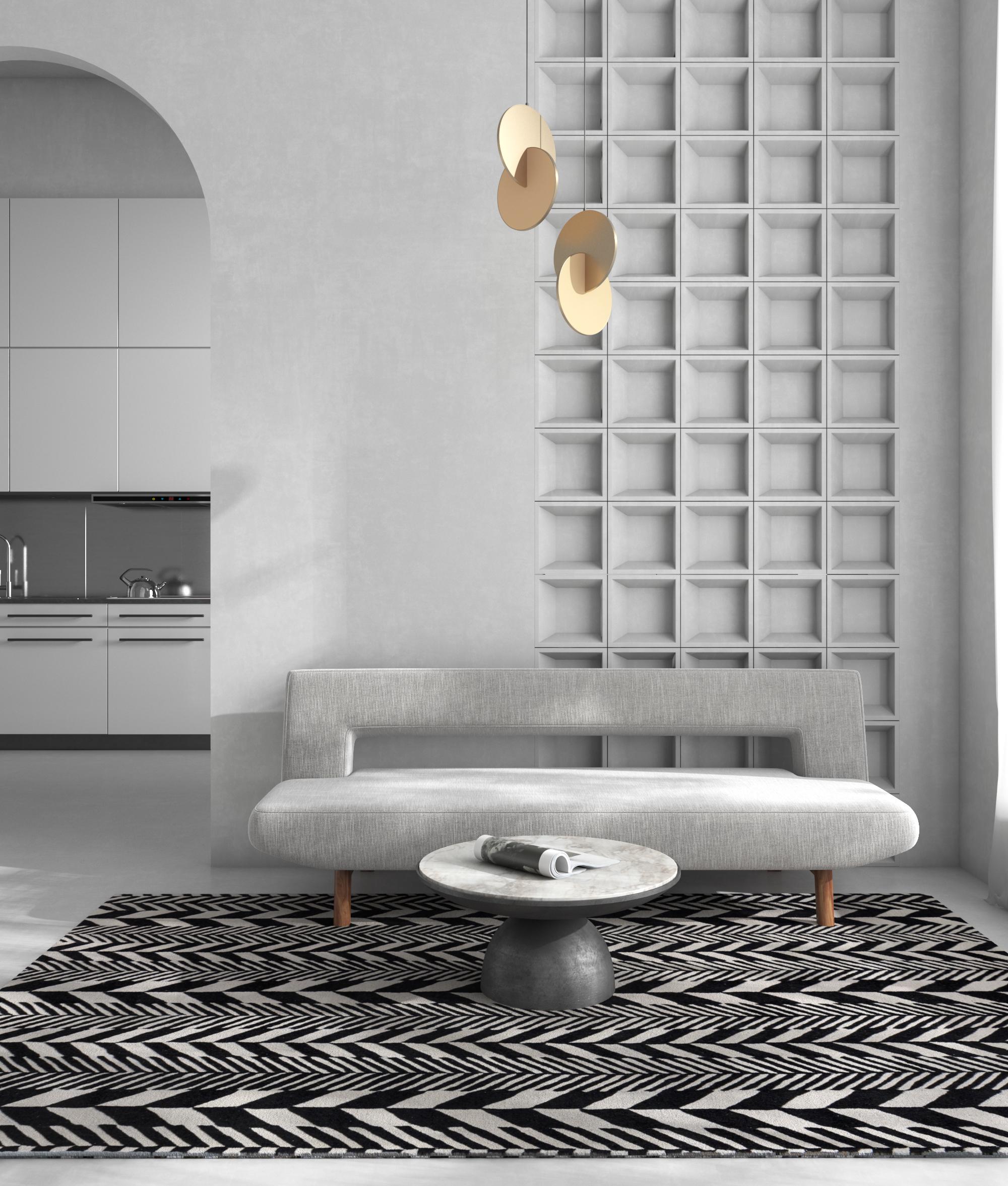 Jaipur Rugs La collezione Adrift è un'audace esplorazione dei contrasti, in cui i sorprendenti disegni in bianco e nero costituiscono la base di ogni pezzo. Questi elementi monocromatici creano una dichiarazione forte e senza tempo, mentre i vivaci