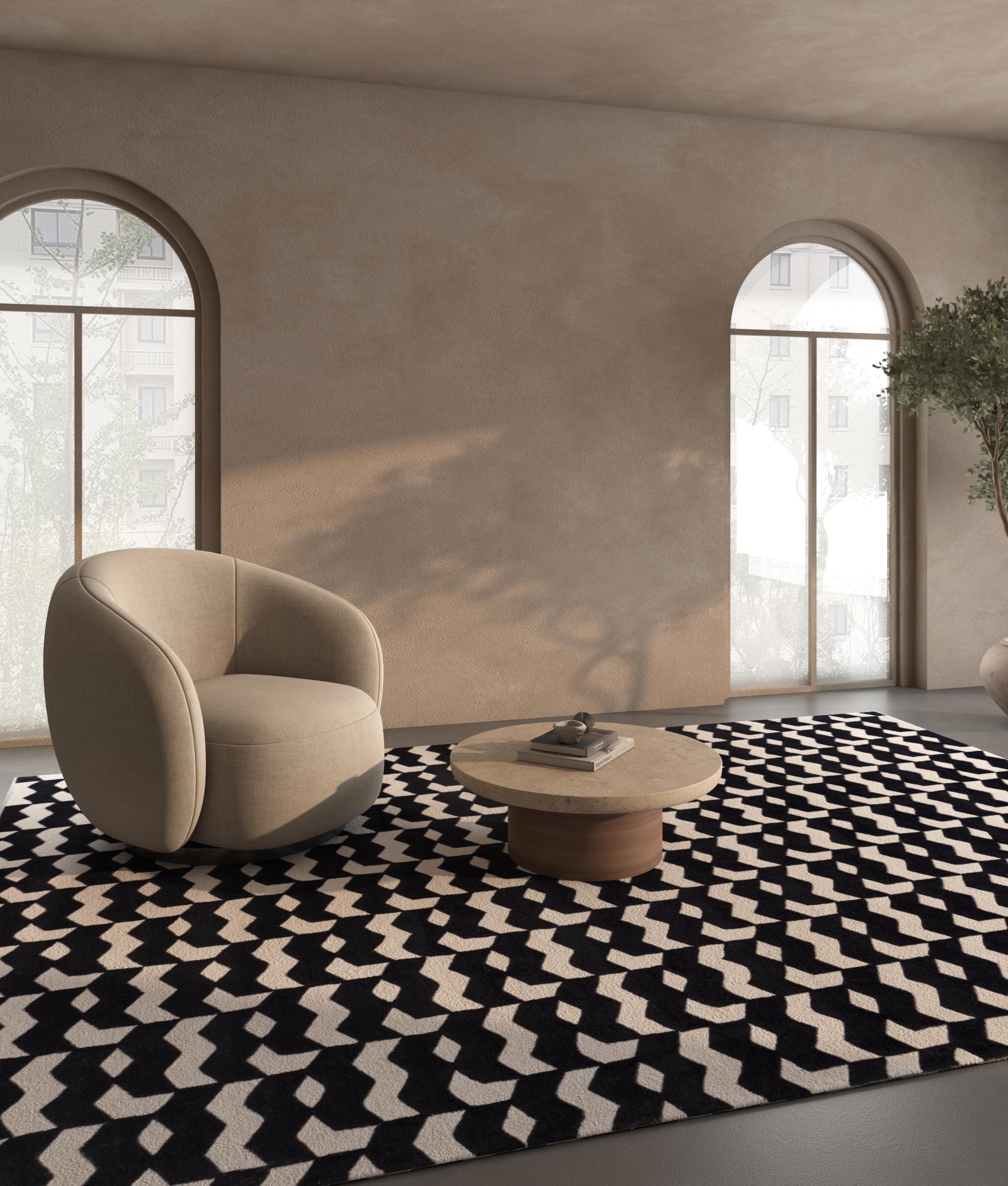 Jaipur Rugs La collezione Adrift è un'audace esplorazione dei contrasti, in cui i sorprendenti disegni in bianco e nero costituiscono la base di ogni pezzo. Questi elementi monocromatici creano una dichiarazione forte e senza tempo, mentre i vivaci
