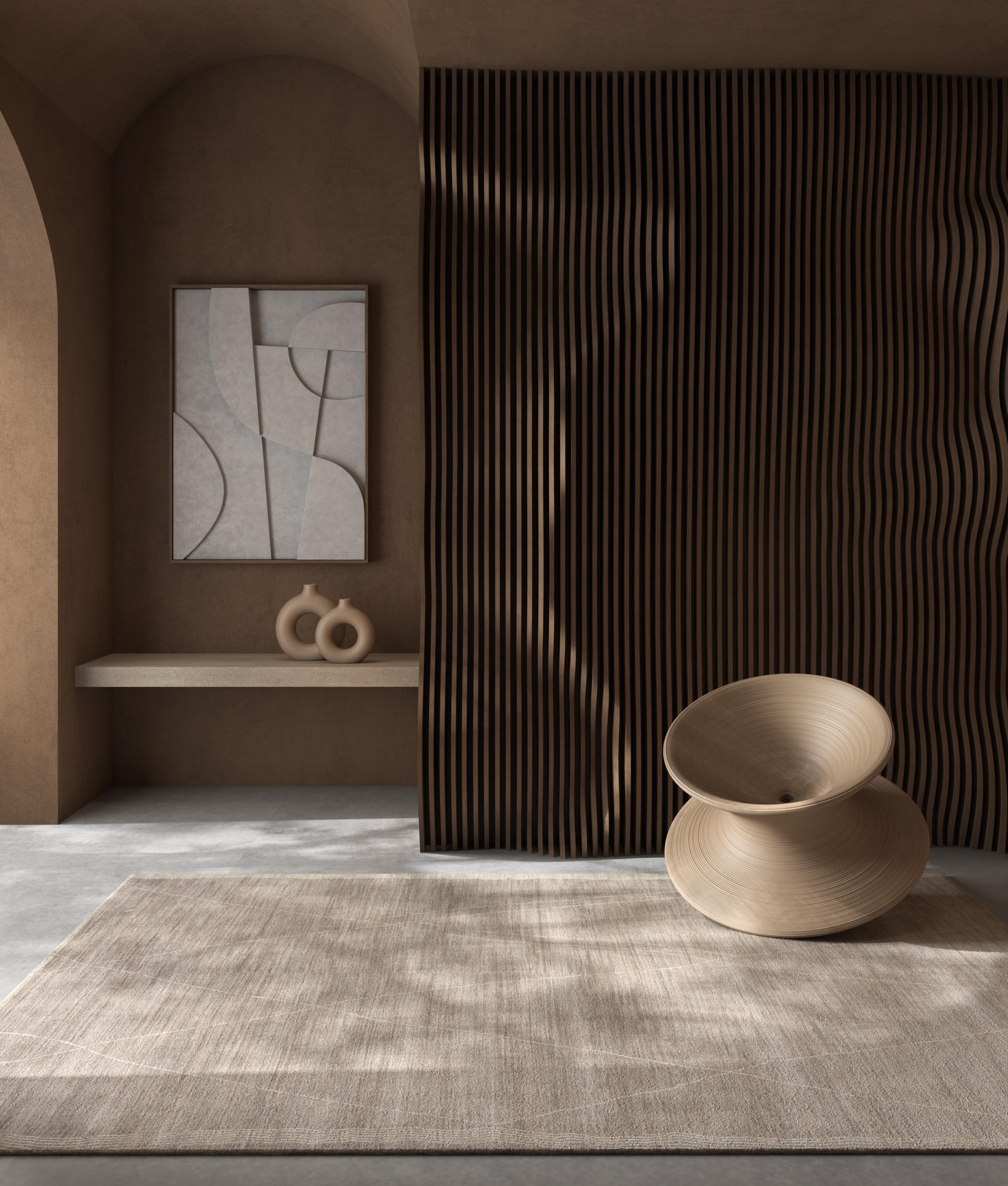 Une merveille de laine qui transcende les conventions ! Doté d'un captivant motif de treillis brisé, ce tapis noué à la main donne du relief aux espaces mondiaux grâce à la chaleur du gris naturel et du blanc naturel, incarnant une sensibilité