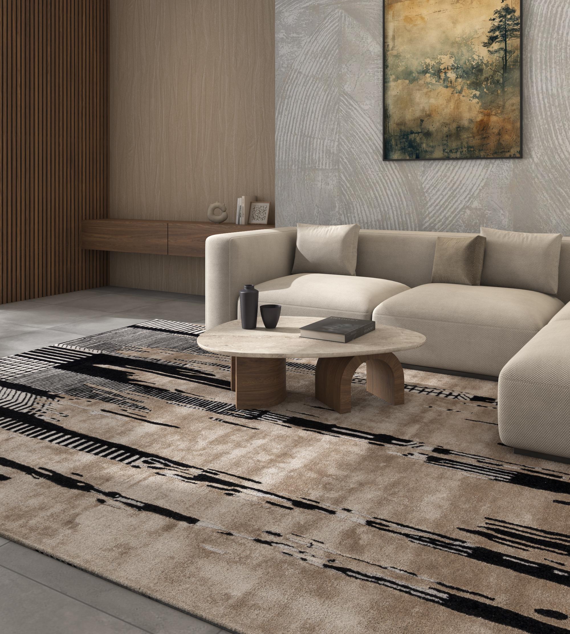 Jaipur Rugs Die Adrift Collection ist eine kühne Erkundung der Kontraste, bei der auffällige Schwarz-Weiß-Muster die Grundlage für jedes Stück bilden. Diese monochromen Elemente sorgen für eine starke, zeitlose Aussage, während kräftige Farbtupfer