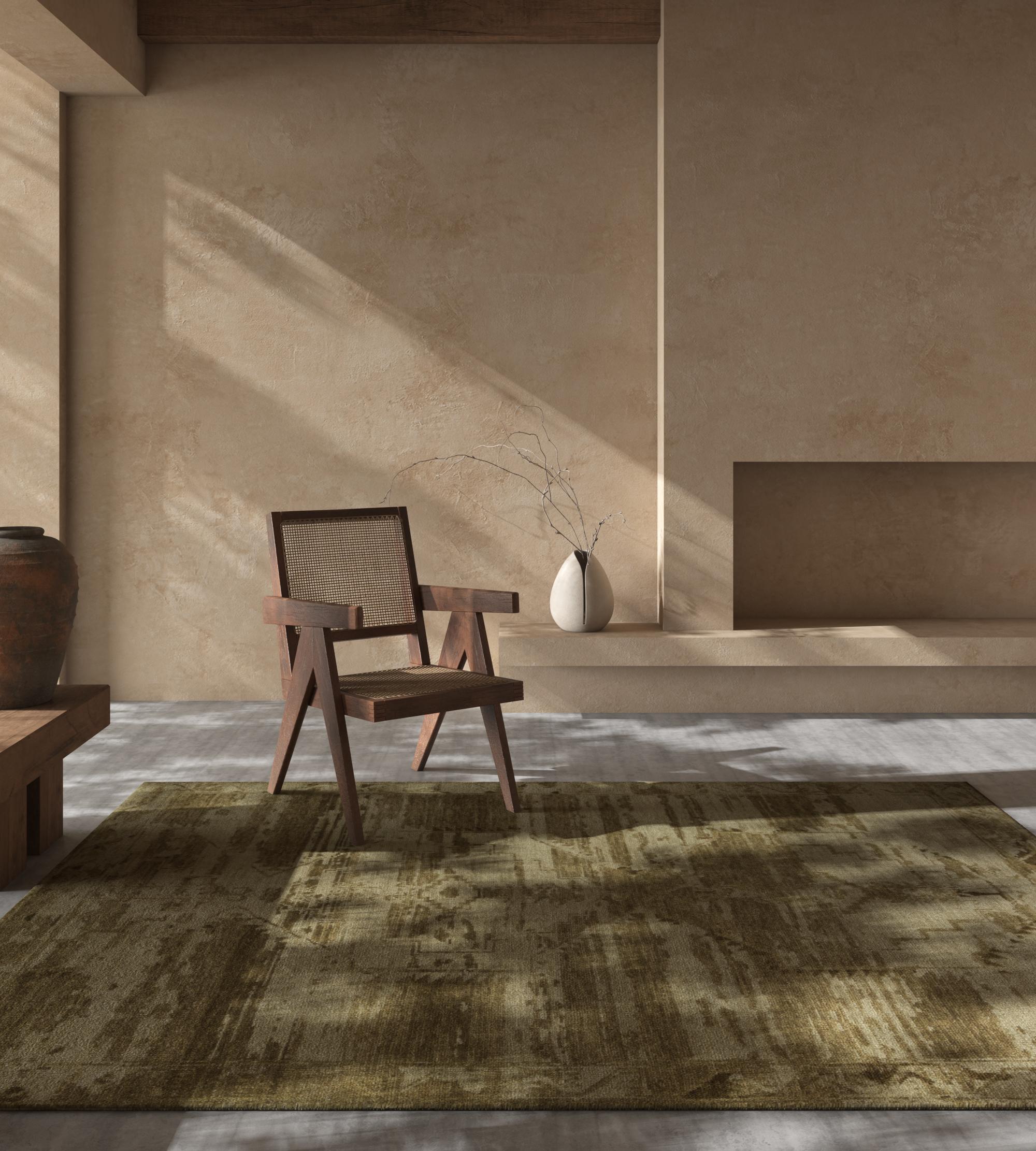 Ce tapis tissé à la main de notre collection Manifest s'inspire du jeu harmonieux des tons sable et brun épicé, créant une atmosphère chaleureuse et accueillante. Le tapis présente un motif tissé complexe rappelant les motifs traditionnels, mais