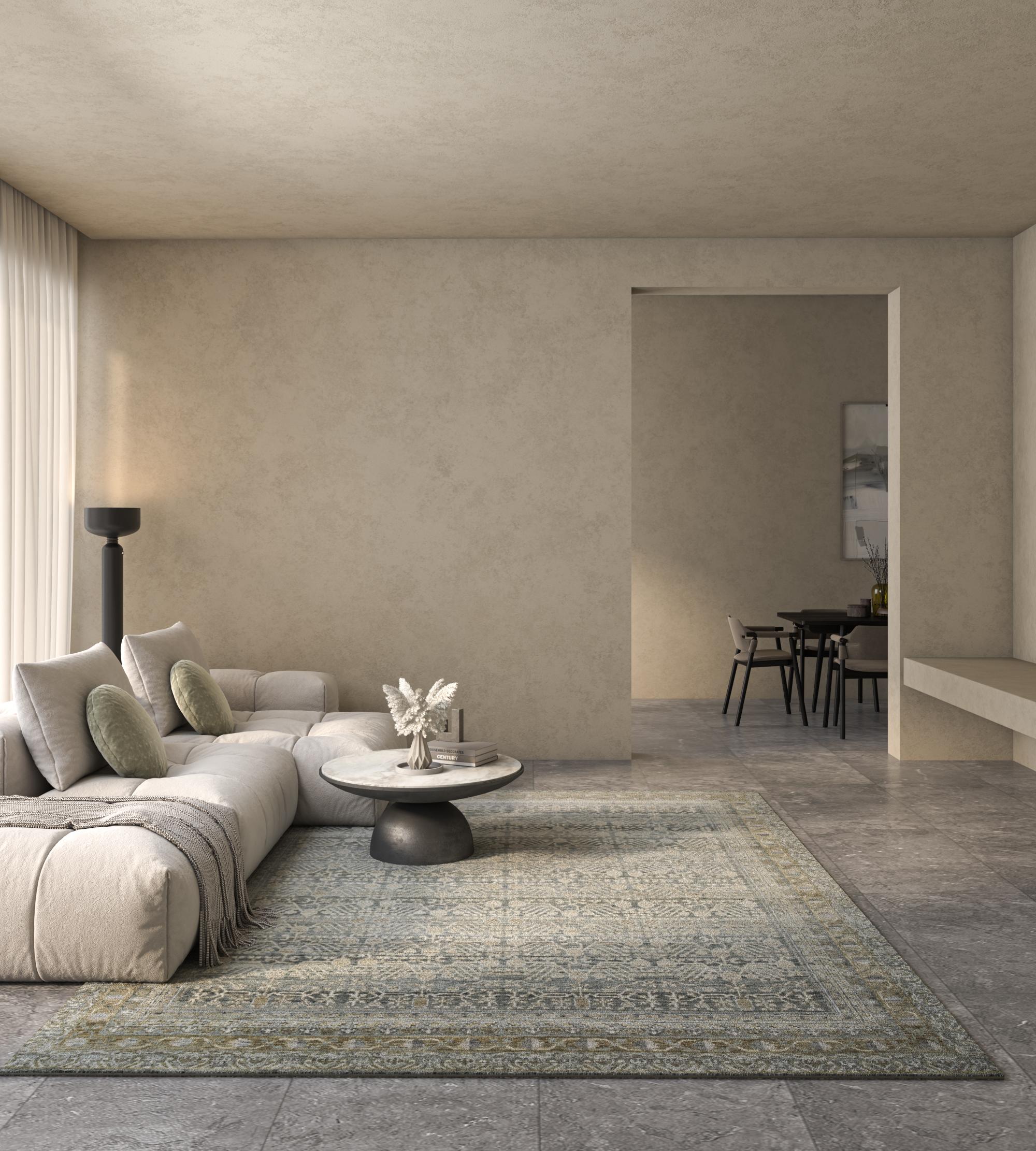 Indulge your senses in the allure of our hand-knotted rug, a harmonious blend of wool and silk that elevates your space with sophistication. The charcoal slate ground color, complemented by a clay border, creates an enchanting tapestry of earthy