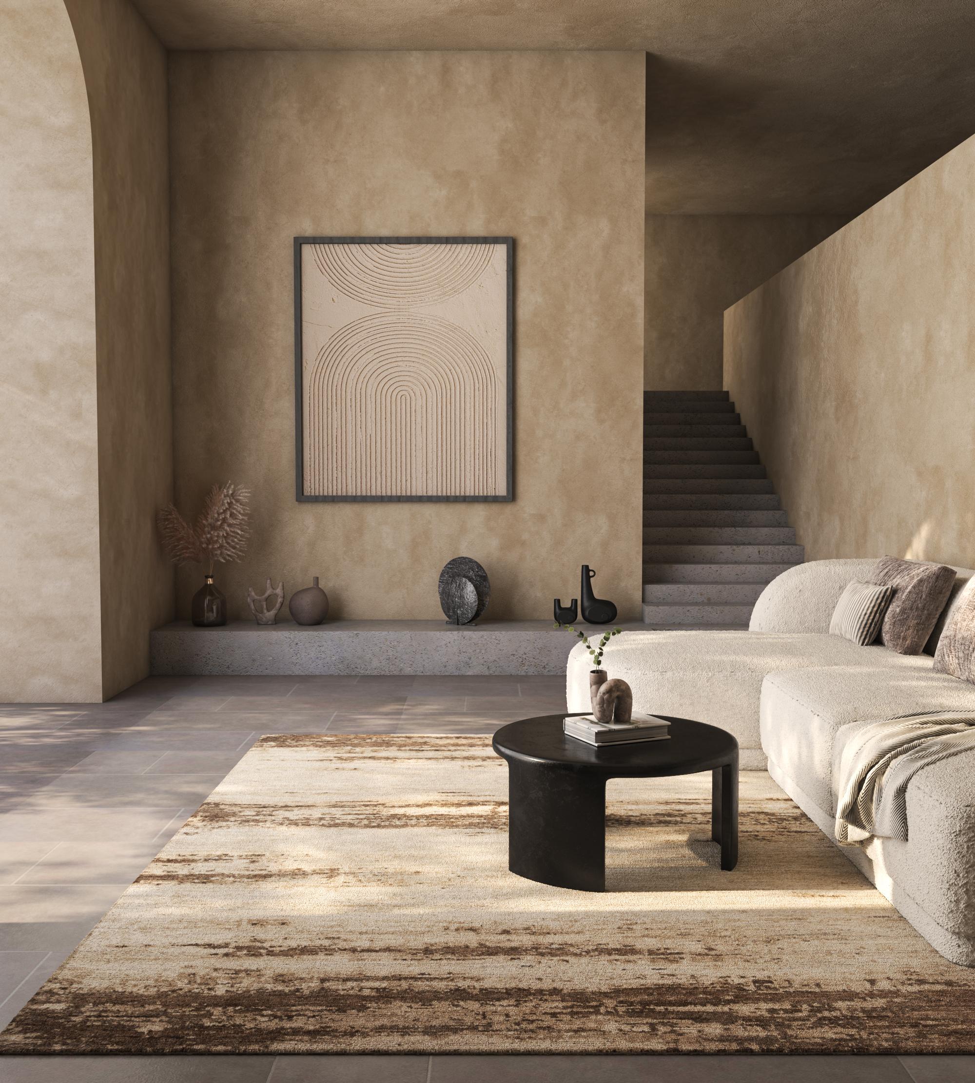 Jaipur Rugs Le déclin progressif des civilisations vers le désordre : les motifs de cette collection semblent créer ce sentiment de désordre et pourtant il y a un sentiment presque hypnotique de calme et de paix dans chacun d'entre eux. C'est de