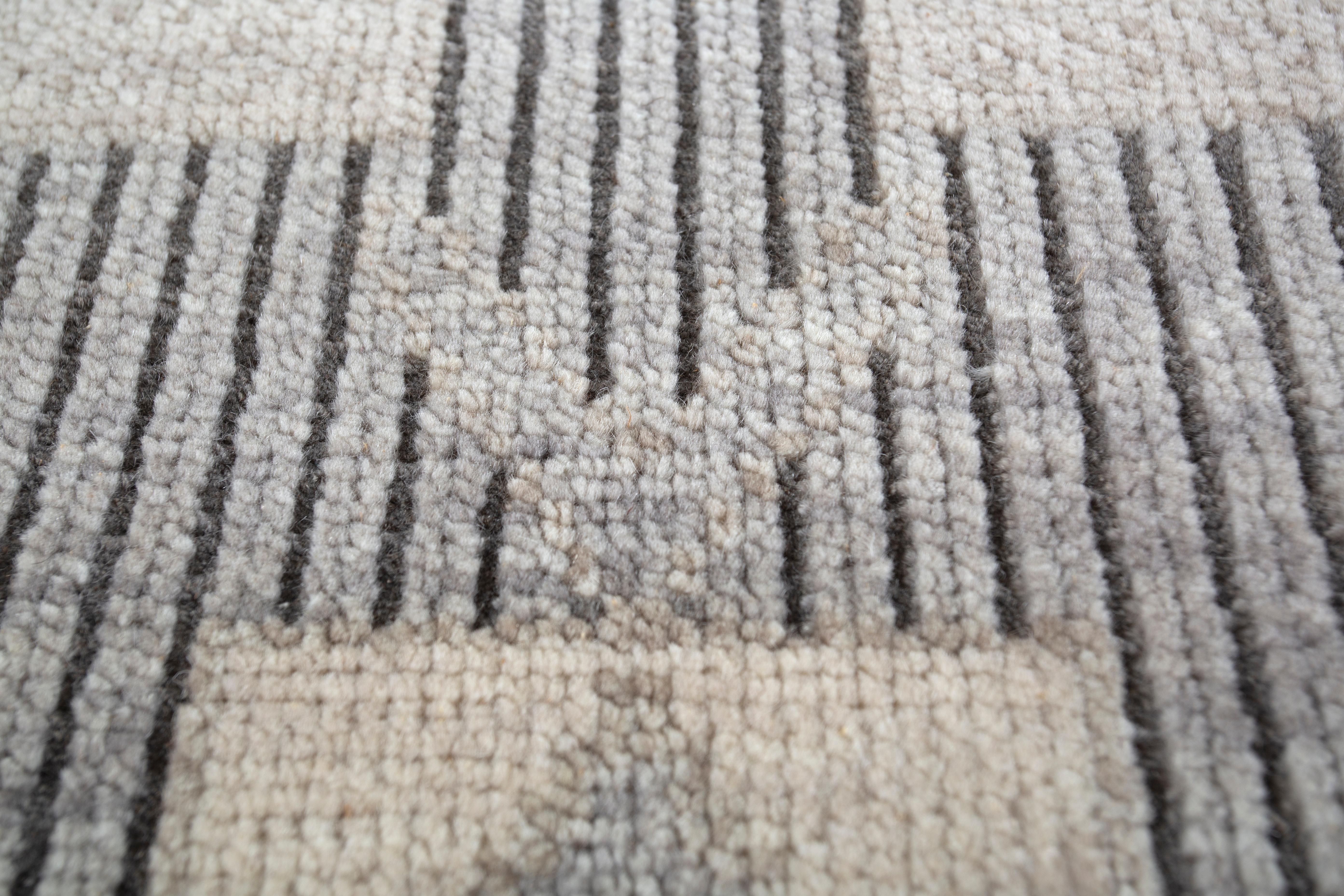 Jaipur Rugs By combining classical and Eastern inspirations, the Thyme collection's hand-knotted carpets honor artistry, legacy, and workmanship while bringing the past and present together. Featuring earthy hues like beige, charcoal, aubergine, and