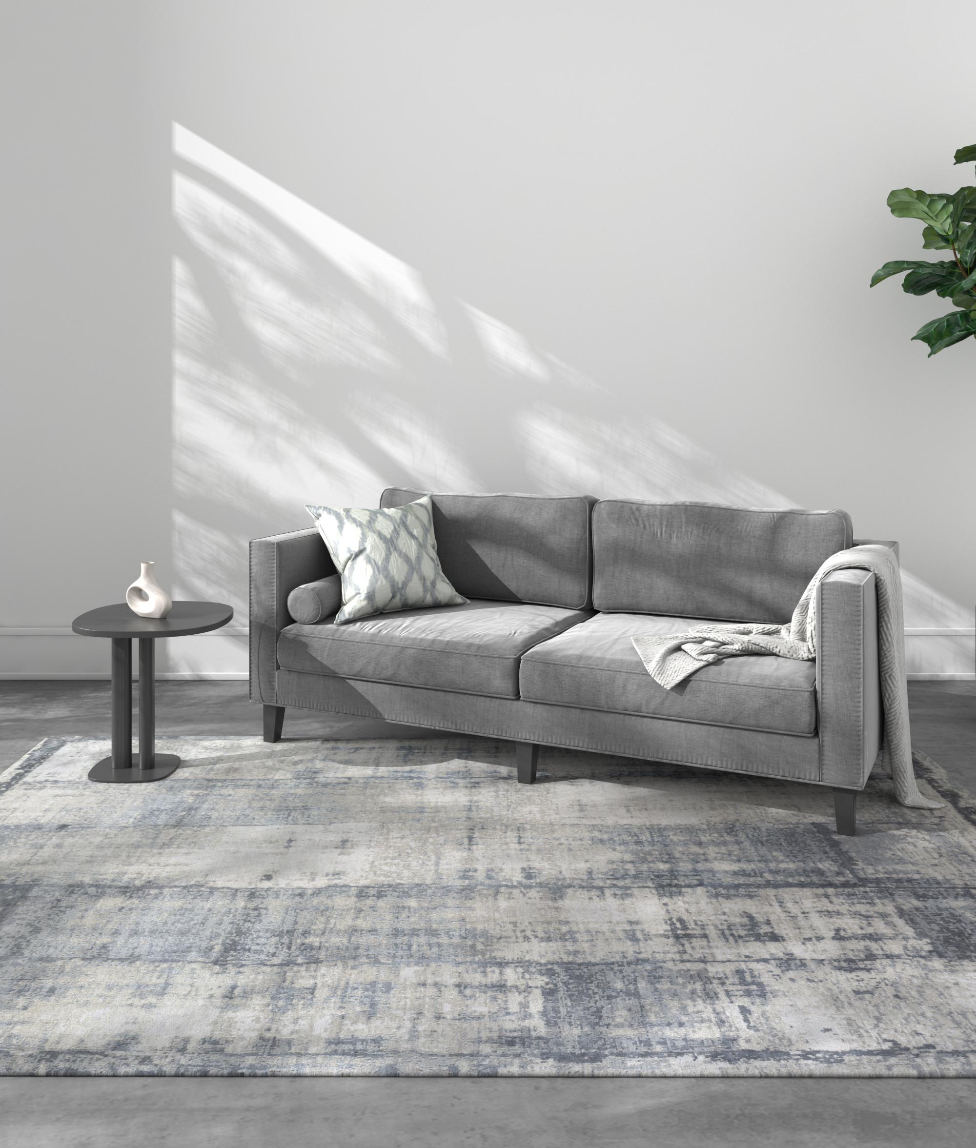 Entdecken Sie mit der opulenten Uvenuti-Kollektion moderne Designs für einen zeitgenössischen Raum. Uvenuti ist eine Kollektion mit Netzstrukturen und abstrakten Mustern, die mit trendigen Blautönen, satten Grautönen und erdigen Weißtönen eine
