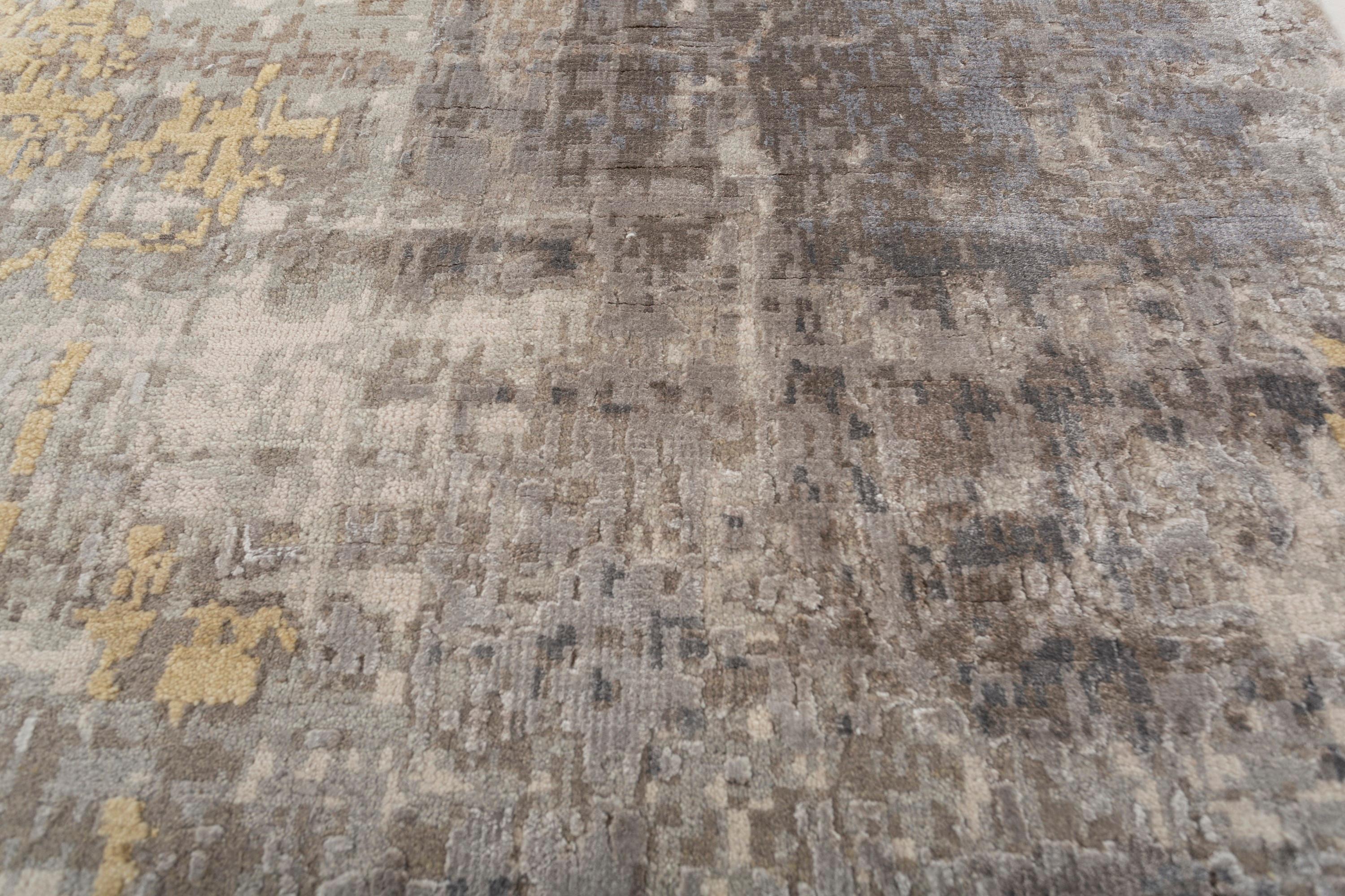 Explore modern designs for a contemporary space with the opulent Uvenuti collection. A collection of mesh textures and abstract designs, Uvenuti weaves a calm atmosphere with on-trend blues, saturated grays, and earth hues of white. Knotted to