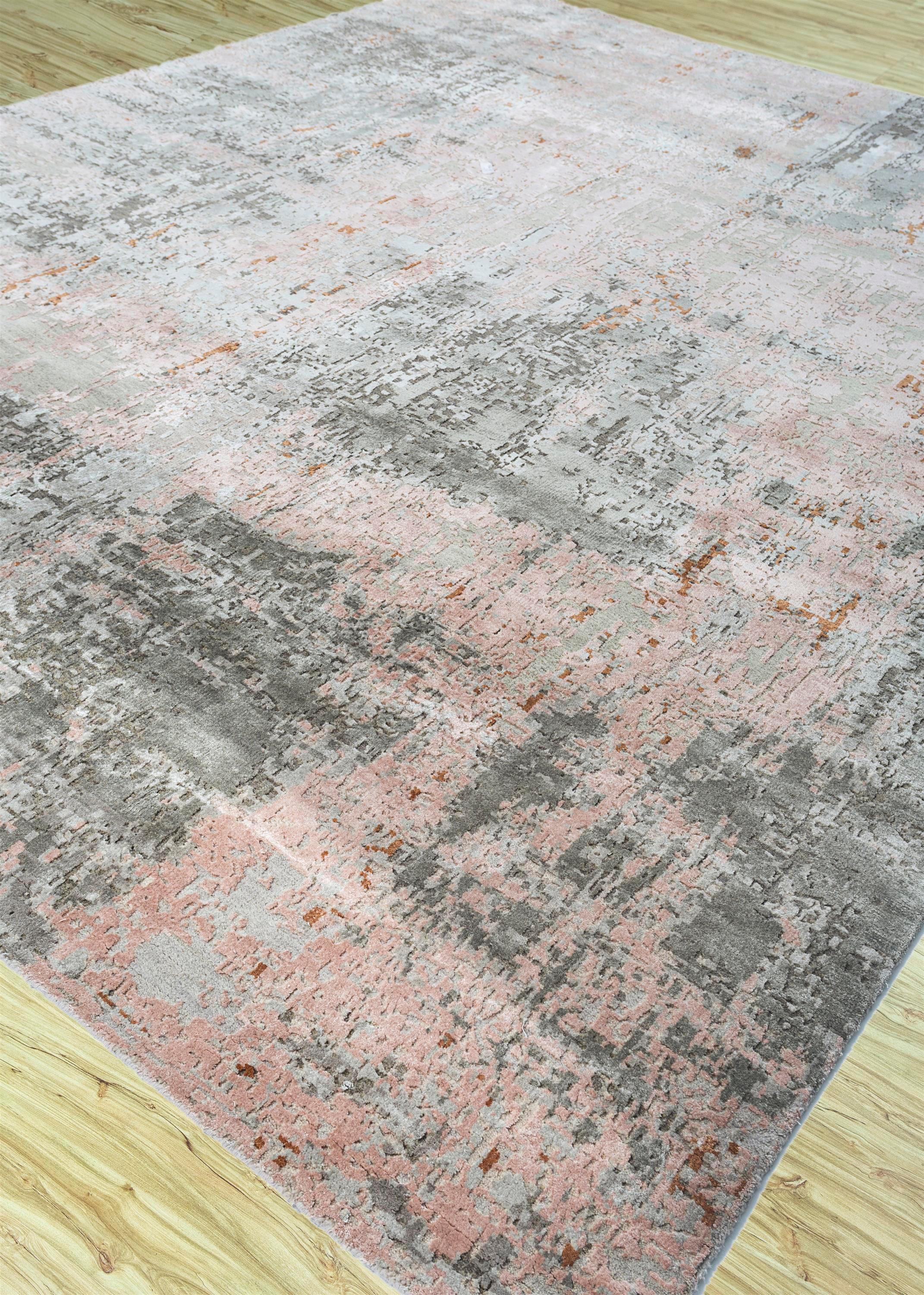 Explore modern designs for a contemporary space with the opulent Uvenuti collection. A collection of mesh textures and abstract designs, Uvenuti weaves a calm atmosphere with on-trend blues, saturated grays, and earth hues of white. Knotted to