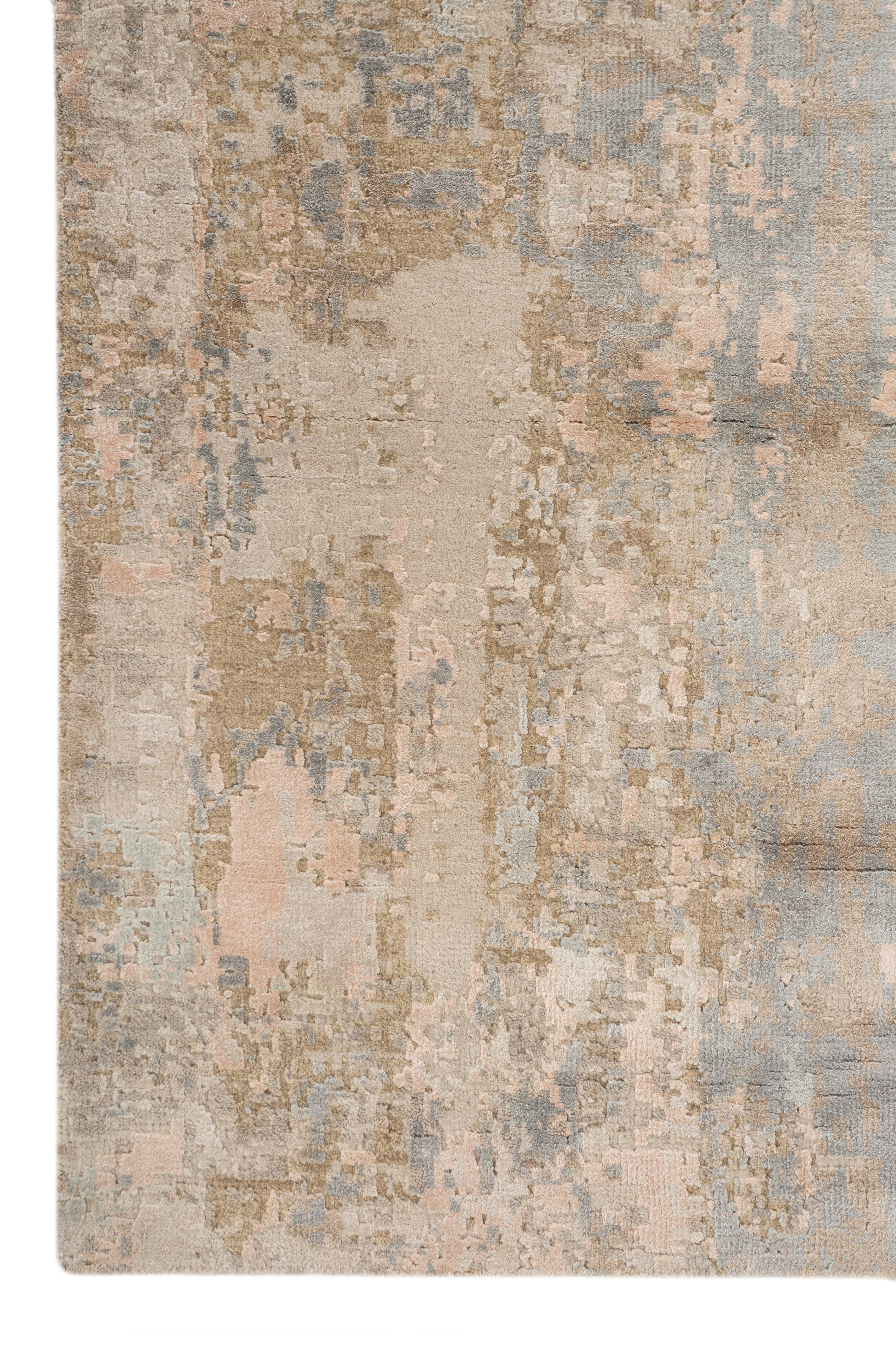 Explore modern designs for a contemporary space with the opulent Uvenuti collection. A collection of mesh textures and abstract designs, Uvenuti weaves a calm atmosphere with on-trend blues, saturated grays, and earth hues of white. Knotted to