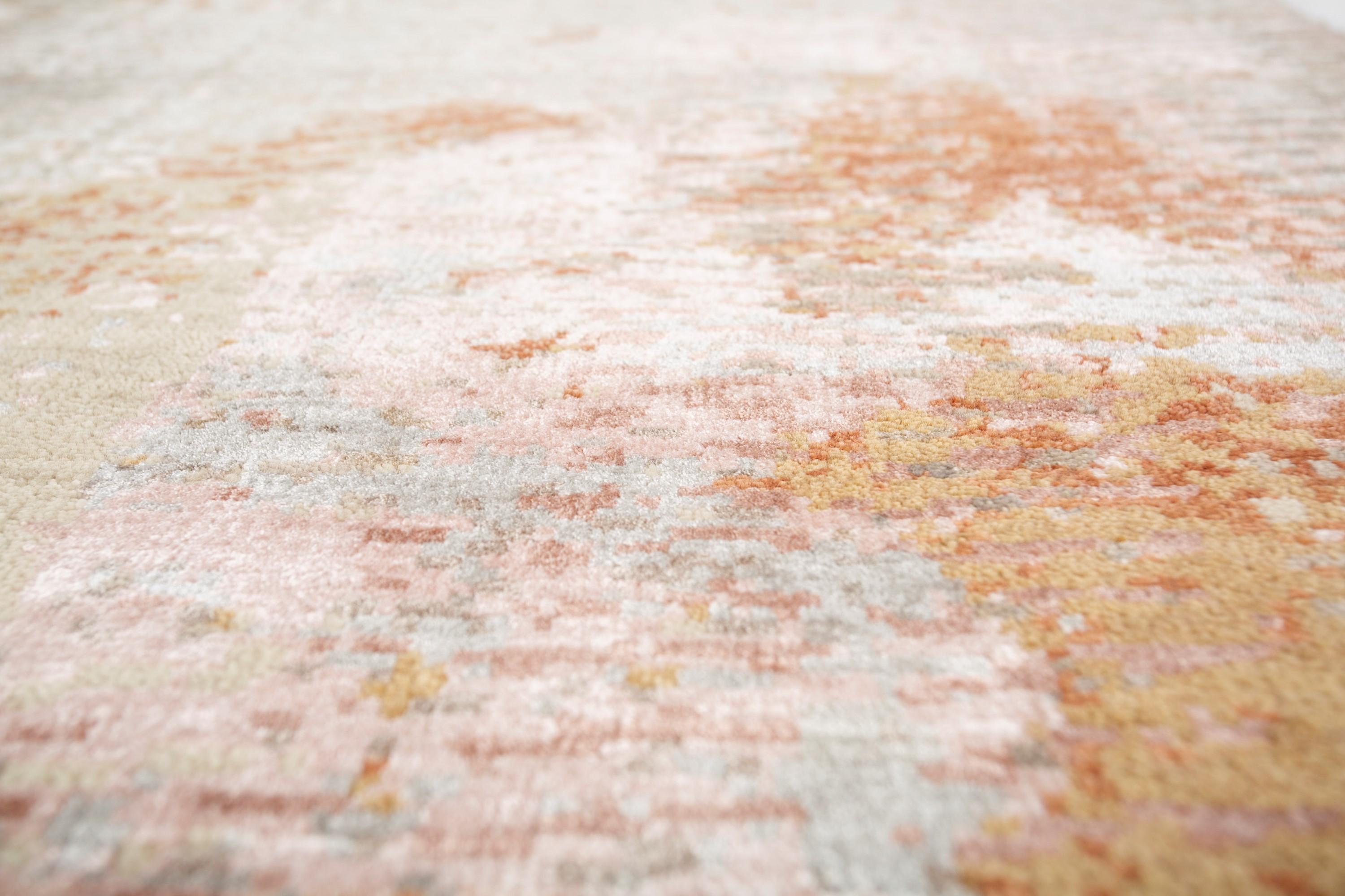 Explore modern designs for a contemporary space with the opulent Uvenuti collection. A collection of mesh textures and abstract designs, Uvenuti weaves a calm atmosphere with on-trend blues, saturated grays, and earth hues of white. Knotted to