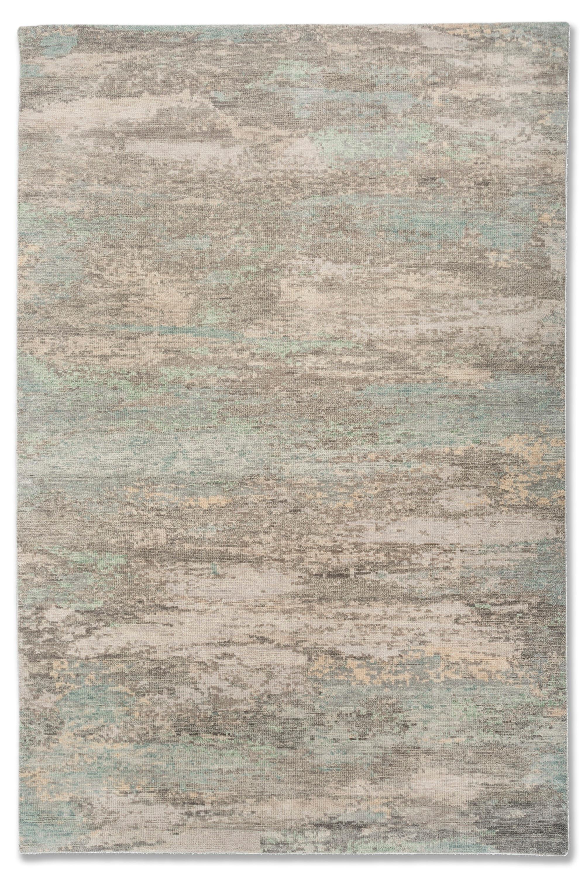 Explore modern designs for a contemporary space with the opulent Uvenuti collection. A collection of mesh textures and abstract designs, Uvenuti weaves a calm atmosphere with on-trend blues, saturated grays, and earth hues of white. Knotted to