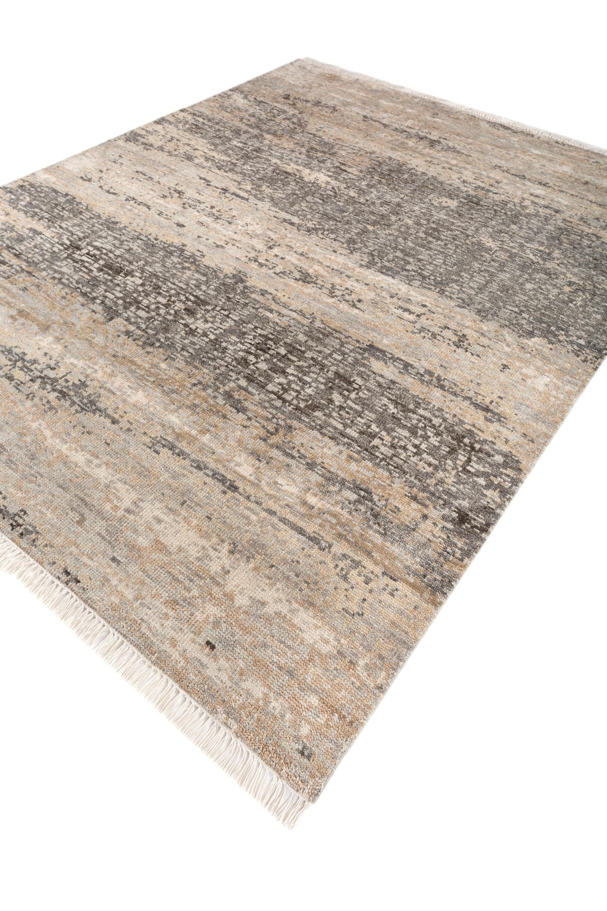 Explore modern designs for a contemporary space with the opulent Uvenuti collection. A collection of mesh textures and abstract designs, Uvenuti weaves a calm atmosphere with on-trend blues, saturated grays, and earth hues of white. Knotted to