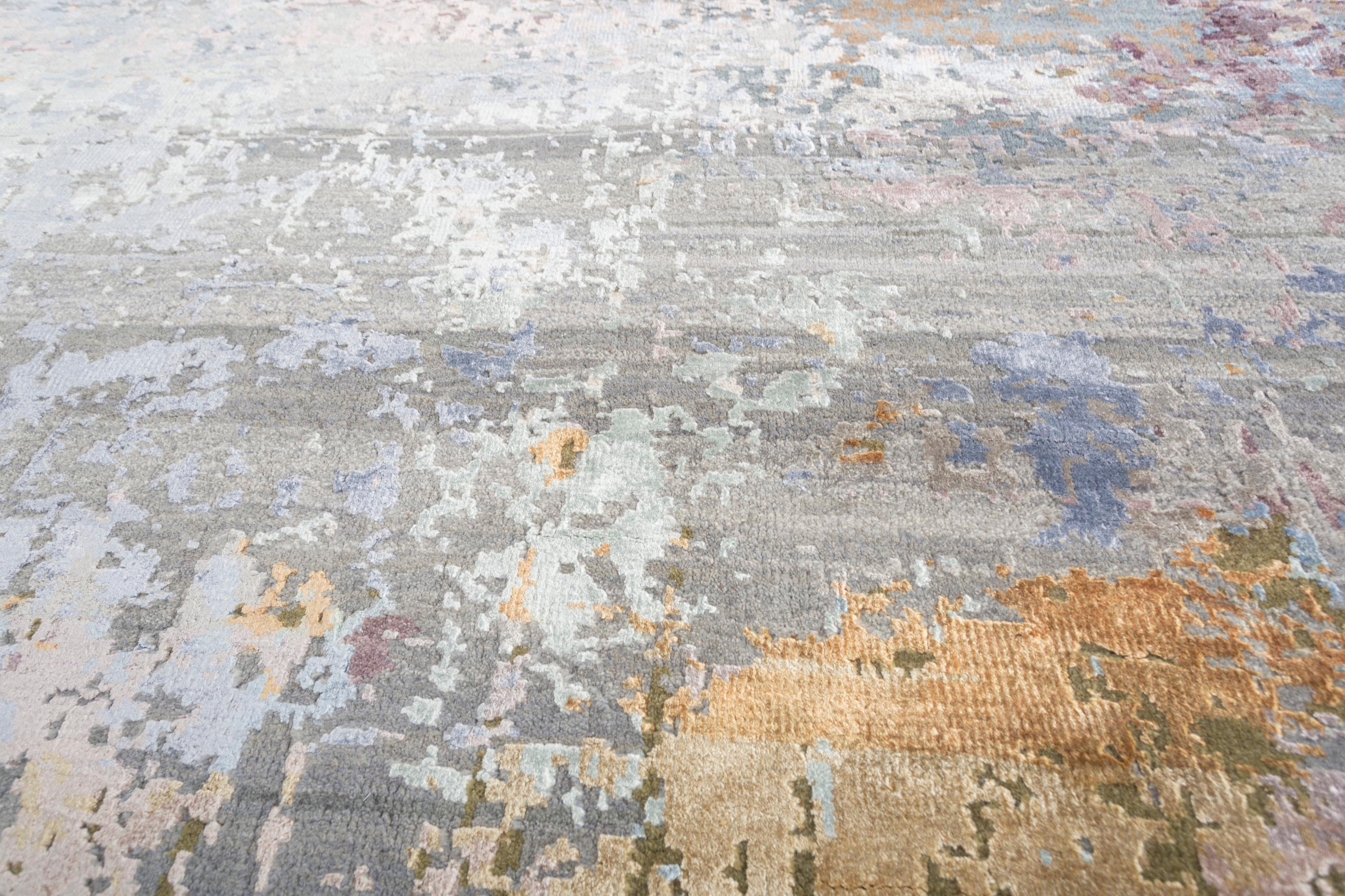Explore modern designs for a contemporary space with the opulent Uvenuti collection. A collection of mesh textures and abstract designs, Uvenuti weaves a calm atmosphere with on-trend blues, saturated grays, and earth hues of white. Knotted to