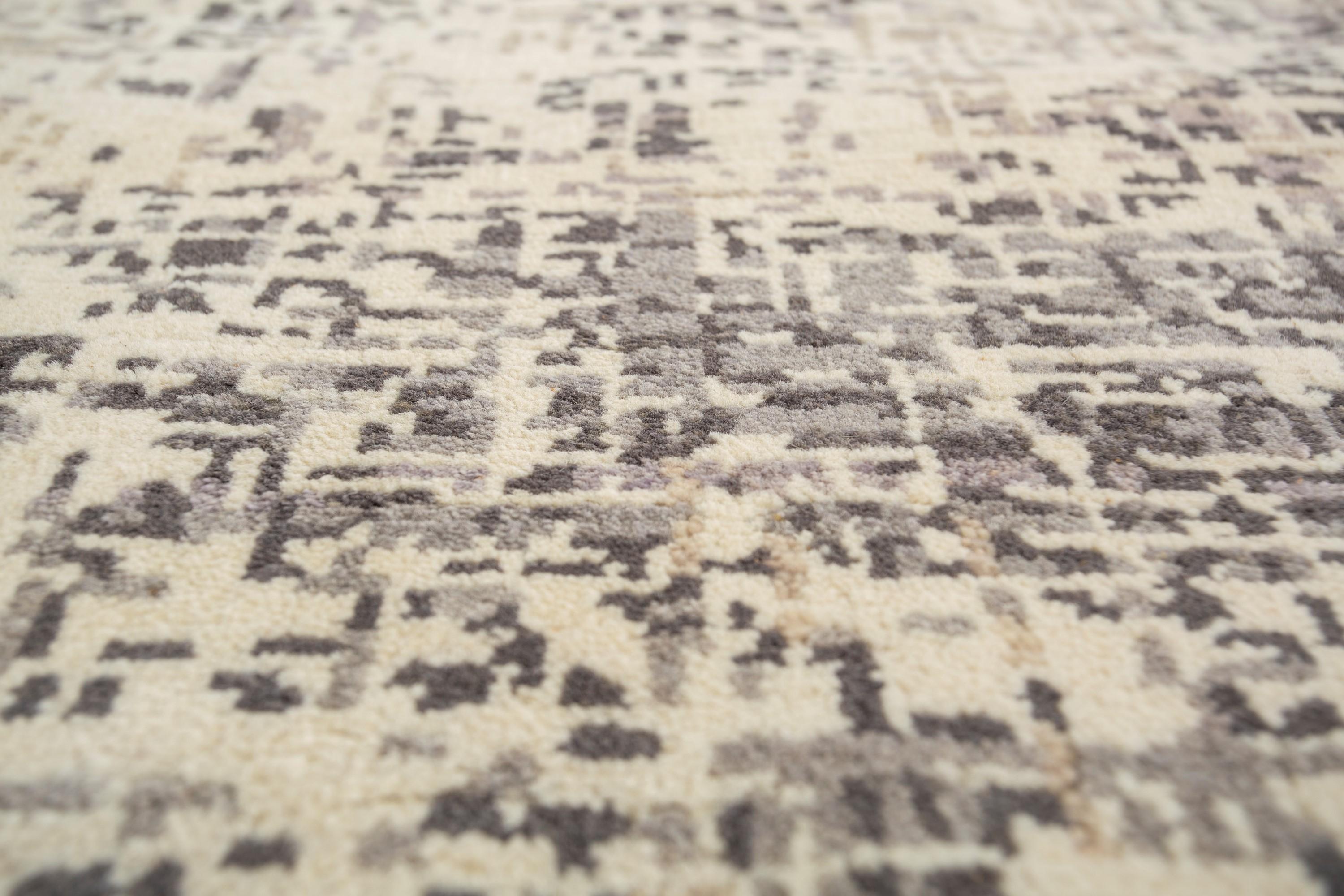 Explore modern designs for a contemporary space with the opulent Uvenuti collection. A collection of mesh textures and abstract designs, Uvenuti weaves a calm atmosphere with on-trend blues, saturated grays, and earth hues of white. Knotted to