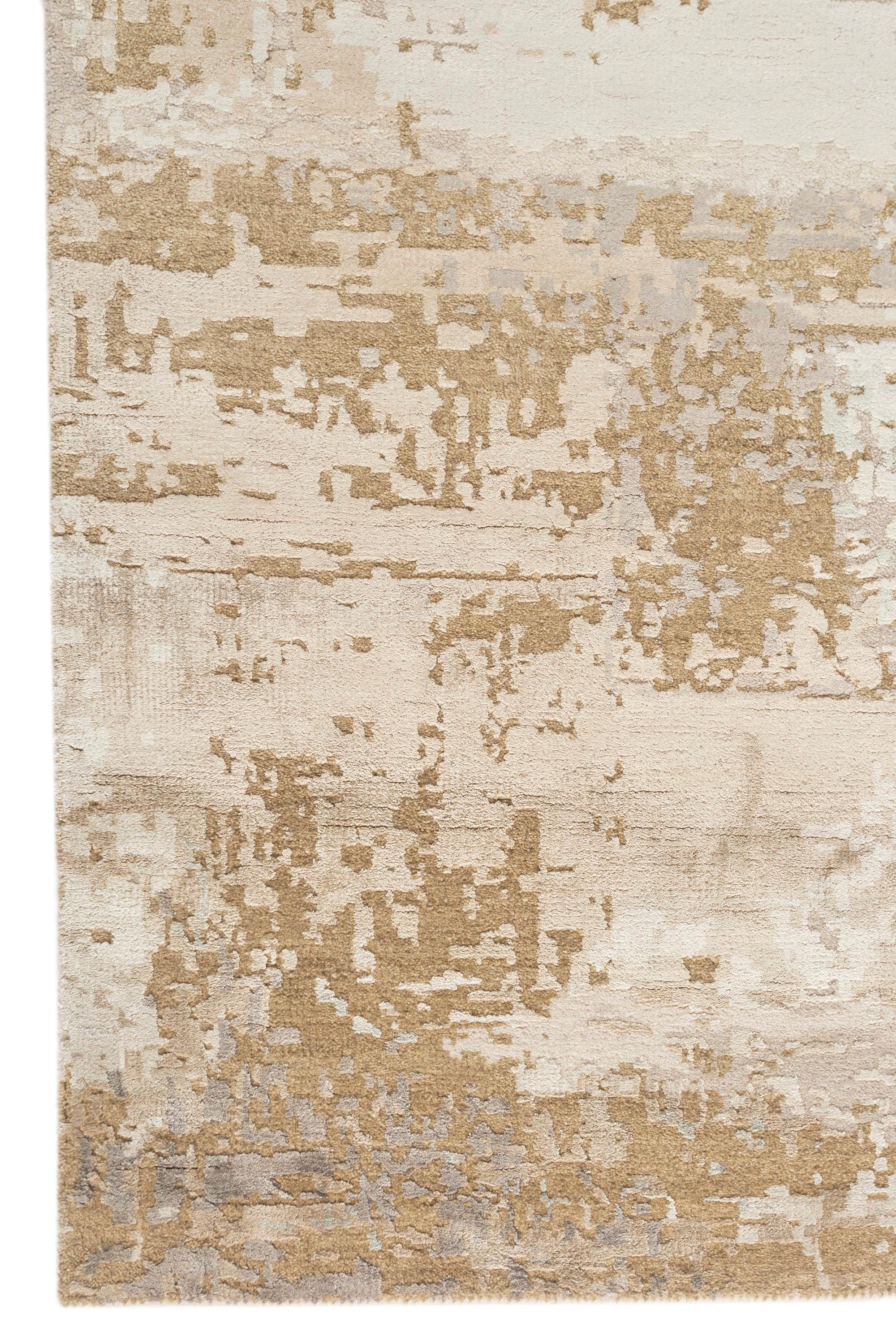 Explore modern designs for a contemporary space with the opulent Uvenuti collection. A collection of mesh textures and abstract designs, Uvenuti weaves a calm atmosphere with on-trend blues, saturated grays, and earth hues of white. Knotted to