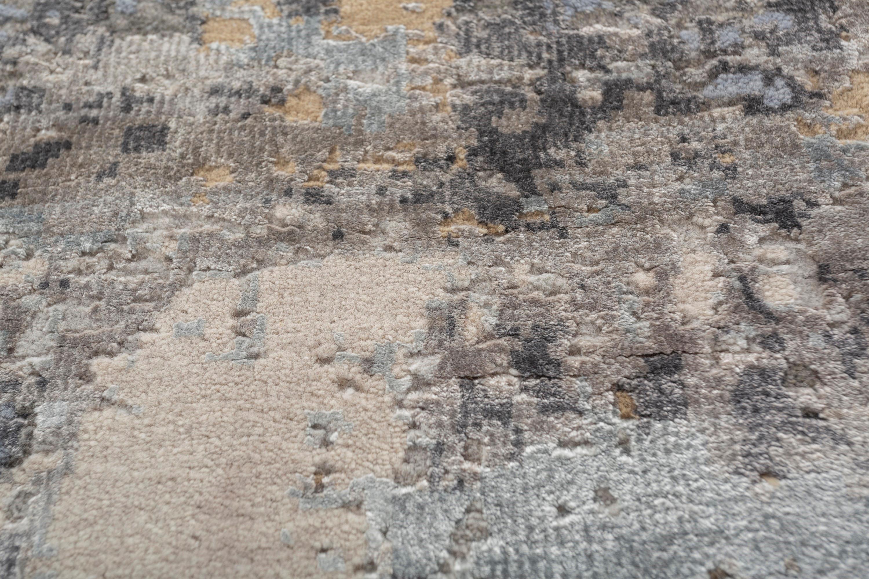Explore modern designs for a contemporary space with the opulent Uvenuti collection. A collection of mesh textures and abstract designs, Uvenuti weaves a calm atmosphere with on-trend blues, saturated grays, and earth hues of white. Knotted to
