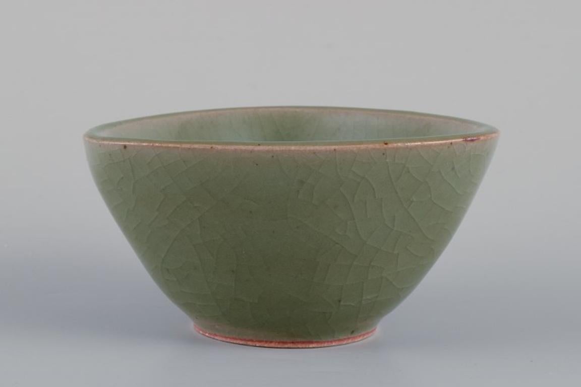 Jais Nielsen per Royal Copenhagen.
Ciotola in ceramica con smalto verde. Scricchiolava. Motivo di creature mitiche.
Model No. 2760.
Datato: 1946.
Contrassegnato.
Prima qualità di fabbrica.
Condizioni perfette.
Dimensioni: L 13,0 cm x H 6,5 cm.