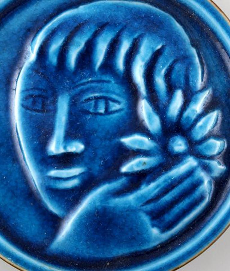 Jais Nielsen for Royal Copenhagen. Ceramic plaque with face of a woman in beautiful blue glaze. 1930s.
In very good condition.
1st factory quality.
Measures: 8 x 1.5 cm
Model number: 21164.