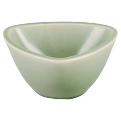 Jais Nielsen for Royal Copenhagen. Triangular ceramic bowl with celadon glaze
