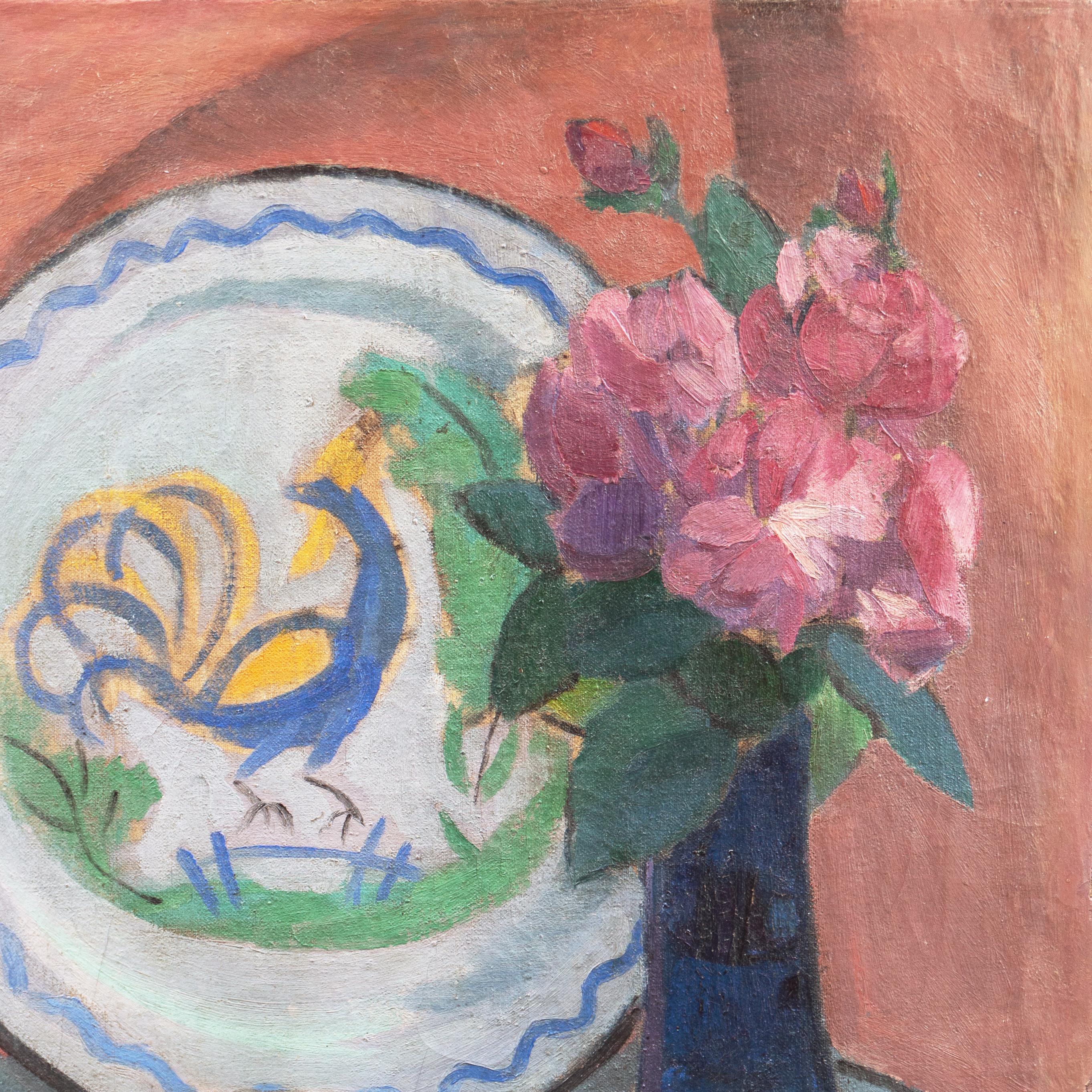 Signed lower right 'Jais' for Jais Nielsen (Danish, 1885-1961) and dated 1913. 

A lyrical, early twentieth-century, Post-Impressionist oil still-life of pink dog-roses shown loosely arranged in a cobalt blue glass vase resting on a turquoise