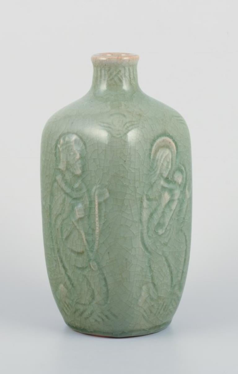 Vernissé Jais Nielsen, Royal Copenhagen Vase en céramique à glaçure céladon. Motifs religieux en vente