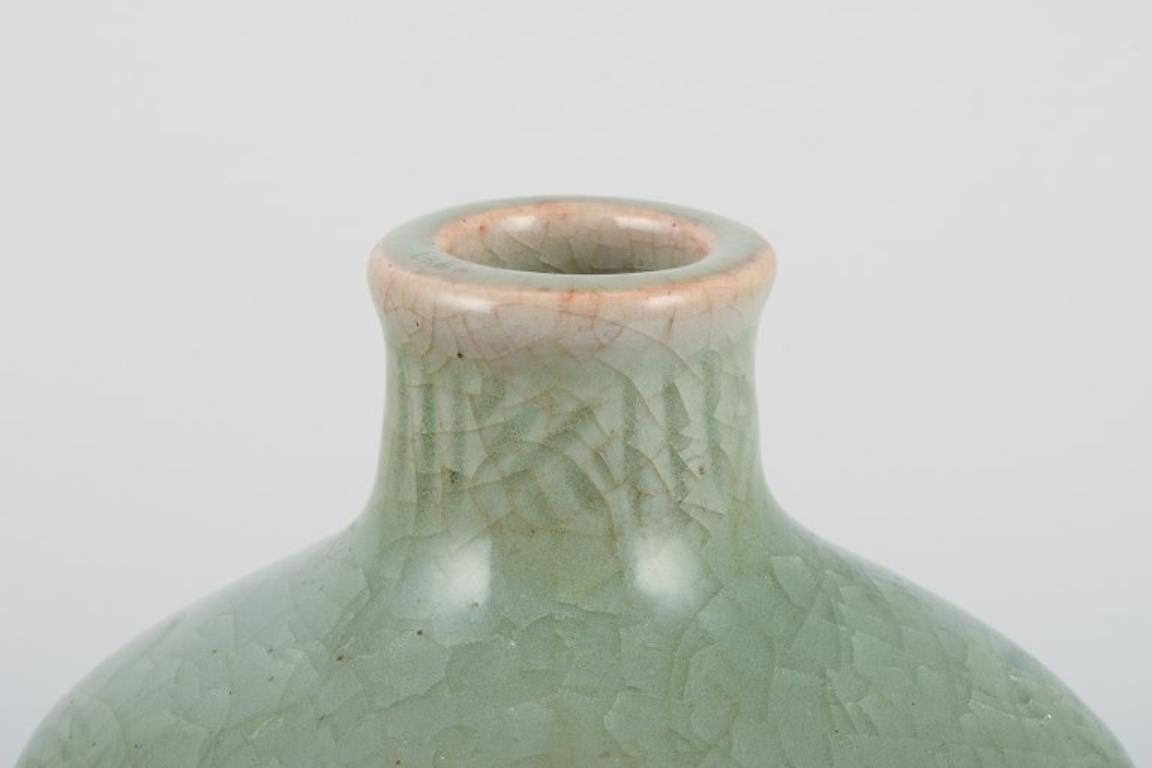 Milieu du XXe siècle Jais Nielsen, Royal Copenhagen Vase en céramique à glaçure céladon. Motifs religieux en vente