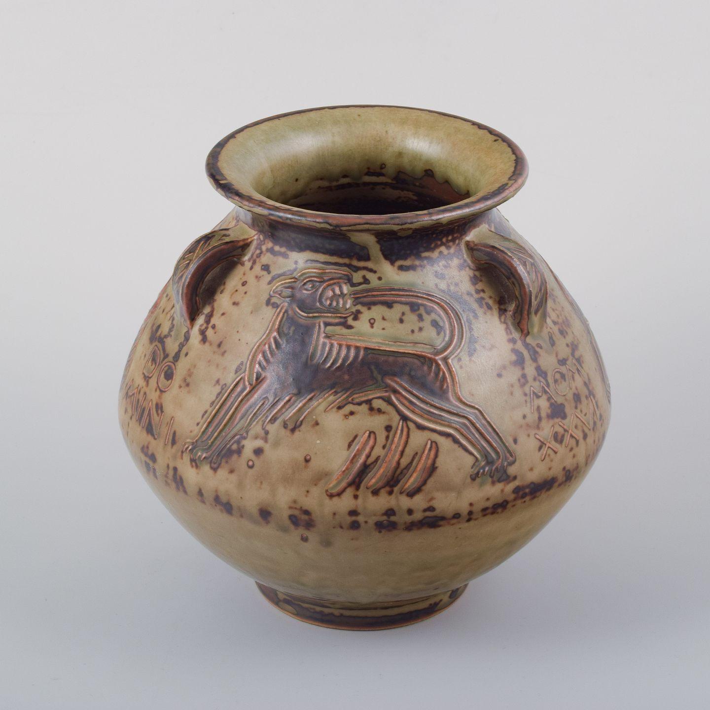 Jais Nielsen, Royal Copenhagen. Jarrón de cerámica esmaltada con motivos religiosos Danés en venta