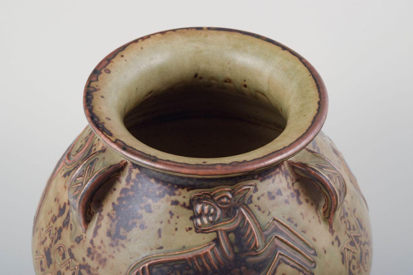 Jais Nielsen, Royal Copenhagen. Jarrón de cerámica esmaltada con motivos religiosos Glaseado en venta