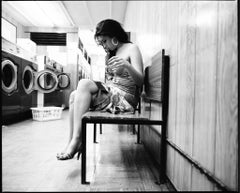 Amy Winehouse at the laundromat by Jake Chessum framed 9x12" print
