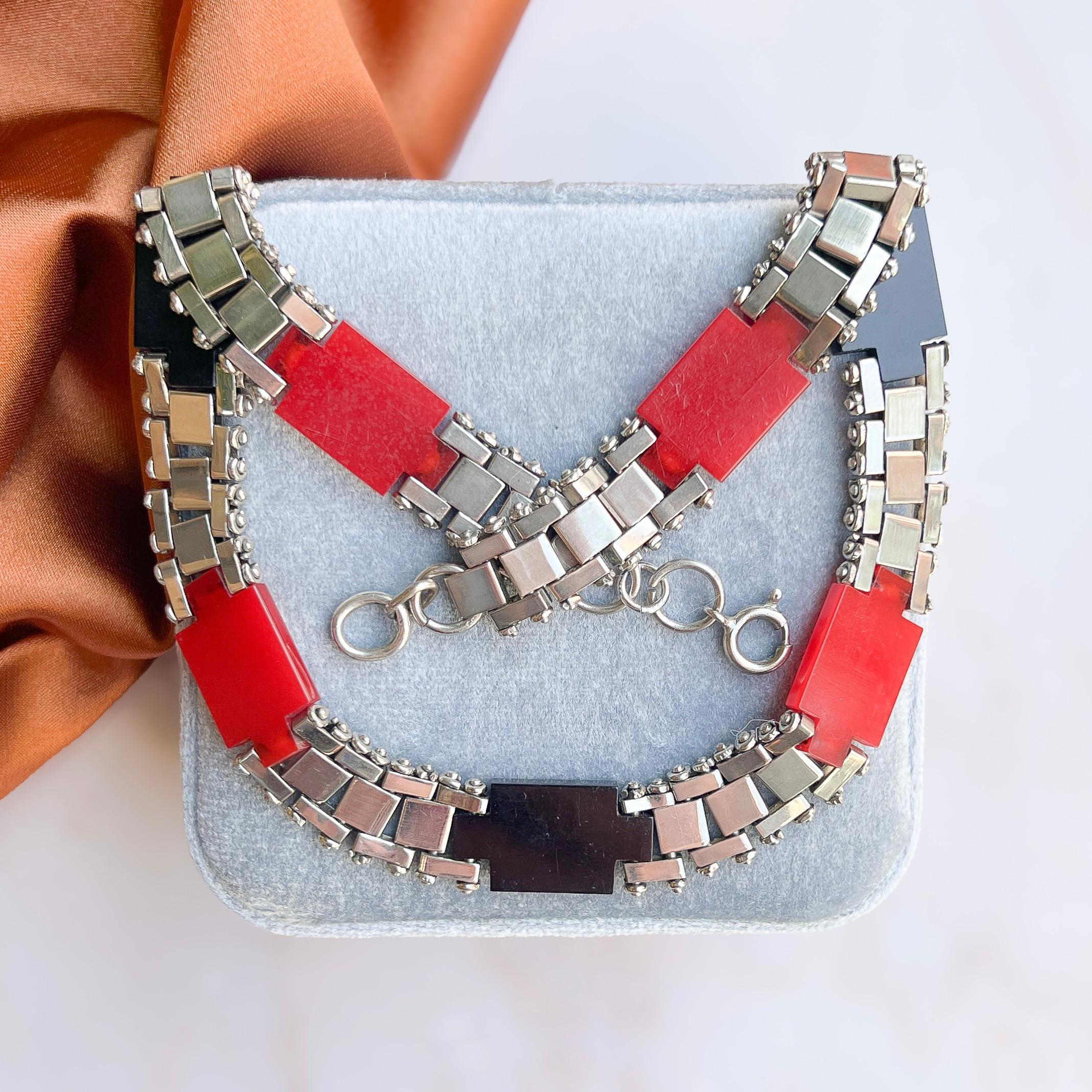 This stylish necklace dates from the 1930s and was created by Jakob Bengel. 

Condition Report:
Very Good - A little ageing to the surface of the Galalith in a couple of small areas. This is only visible upon very close inspection and does not