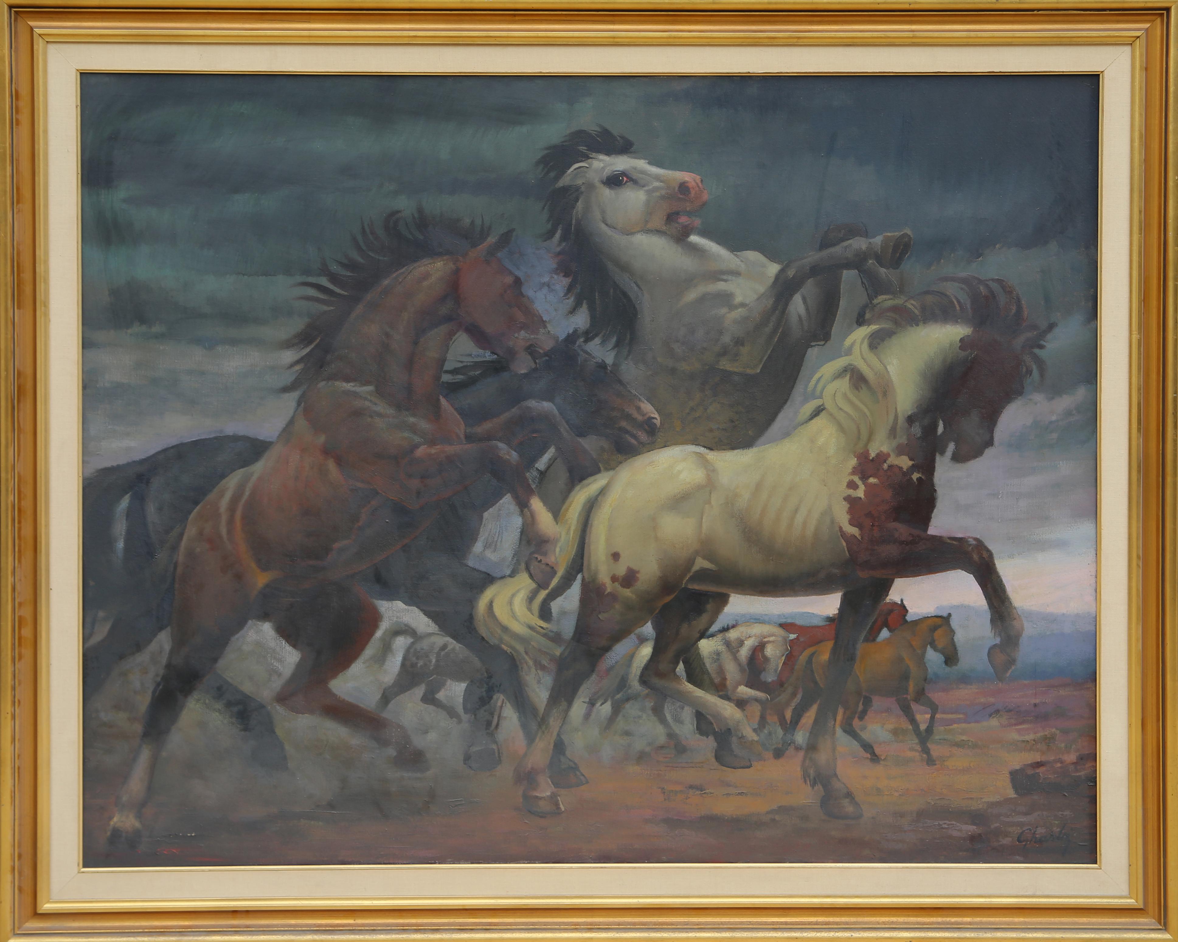 A large oil painting of stampeding Wild Horses by Tunisian-born artist, Jalal Gharbi (1920 - 2005).  The painting measures 48 x 60 inches and the frame 56.5 x 68.5 inches.