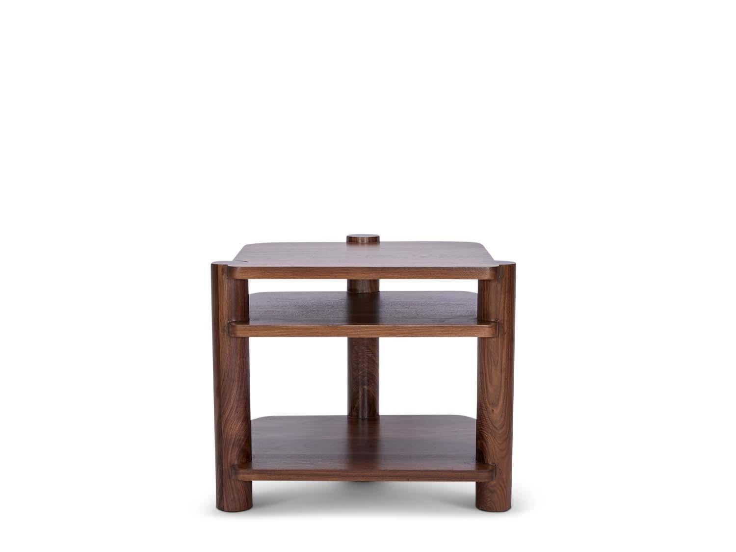 The Jalama End Table pairs sturdy hardwood dowels with cascading selves that play with various soft corners. 
