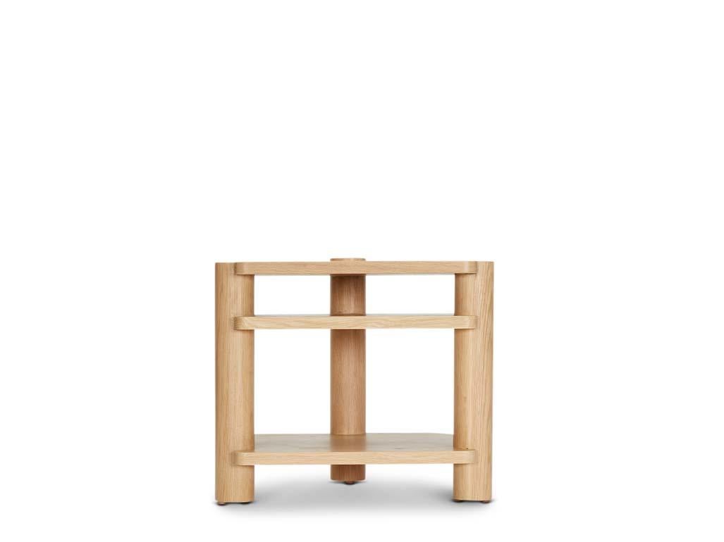 The Jalama End Table pairs sturdy hardwood dowels with cascading selves that play with various soft corners. 