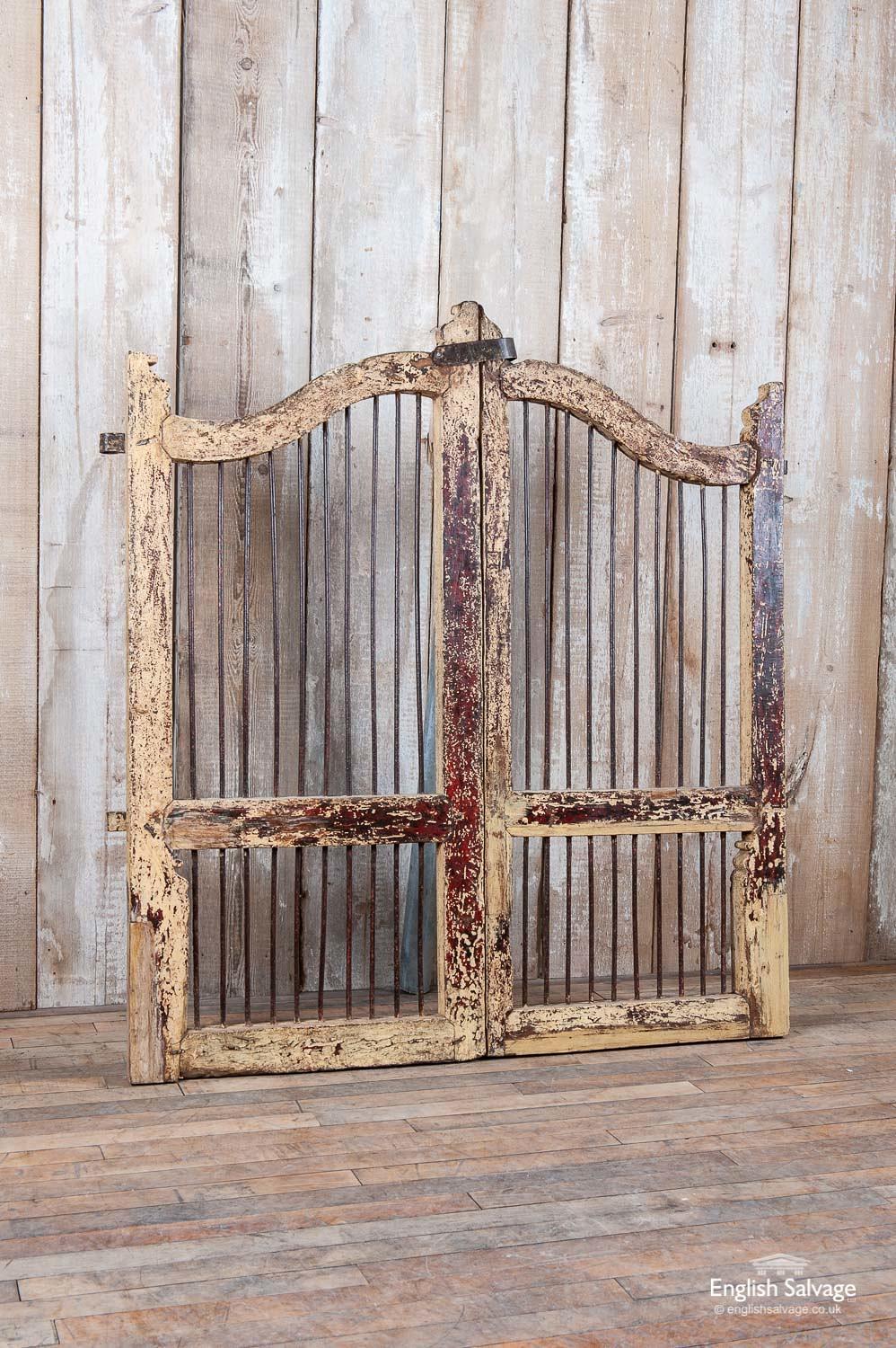 Teak jali dog gates/ saloon door from India. Iron bars, hinges and top clasp with solid teak frame.