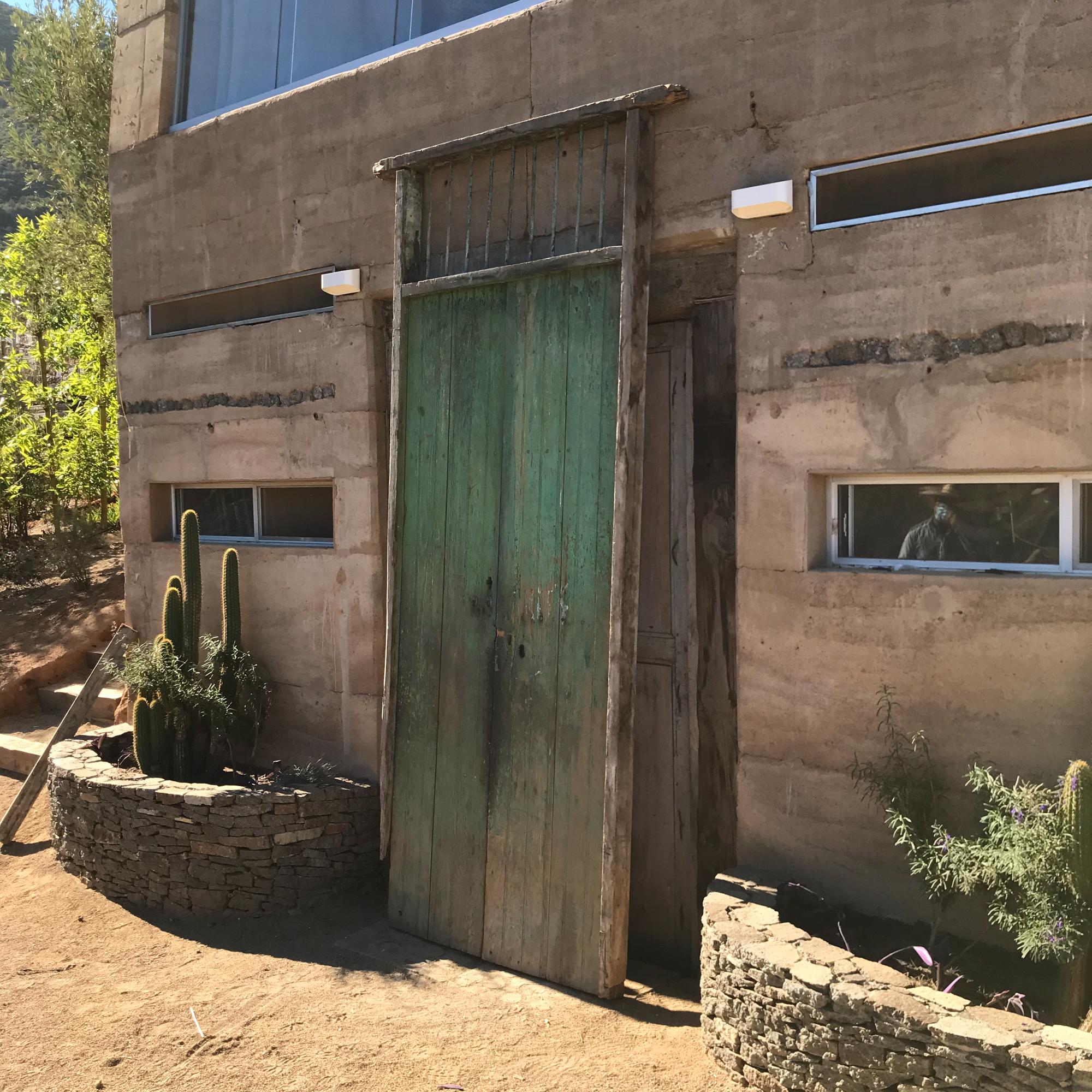 1920s Old Hacienda Rustic Green Barn Doors made in Solid Slab Mesquite Wood Jalisco Mexico 
Handmade by Mexican Artisans
115.5 tall x 44.75 W x 3.75 thick (wood frame), Doors 41 W x 94.5 tall.
An unrestored item in beautifully distressed condition.