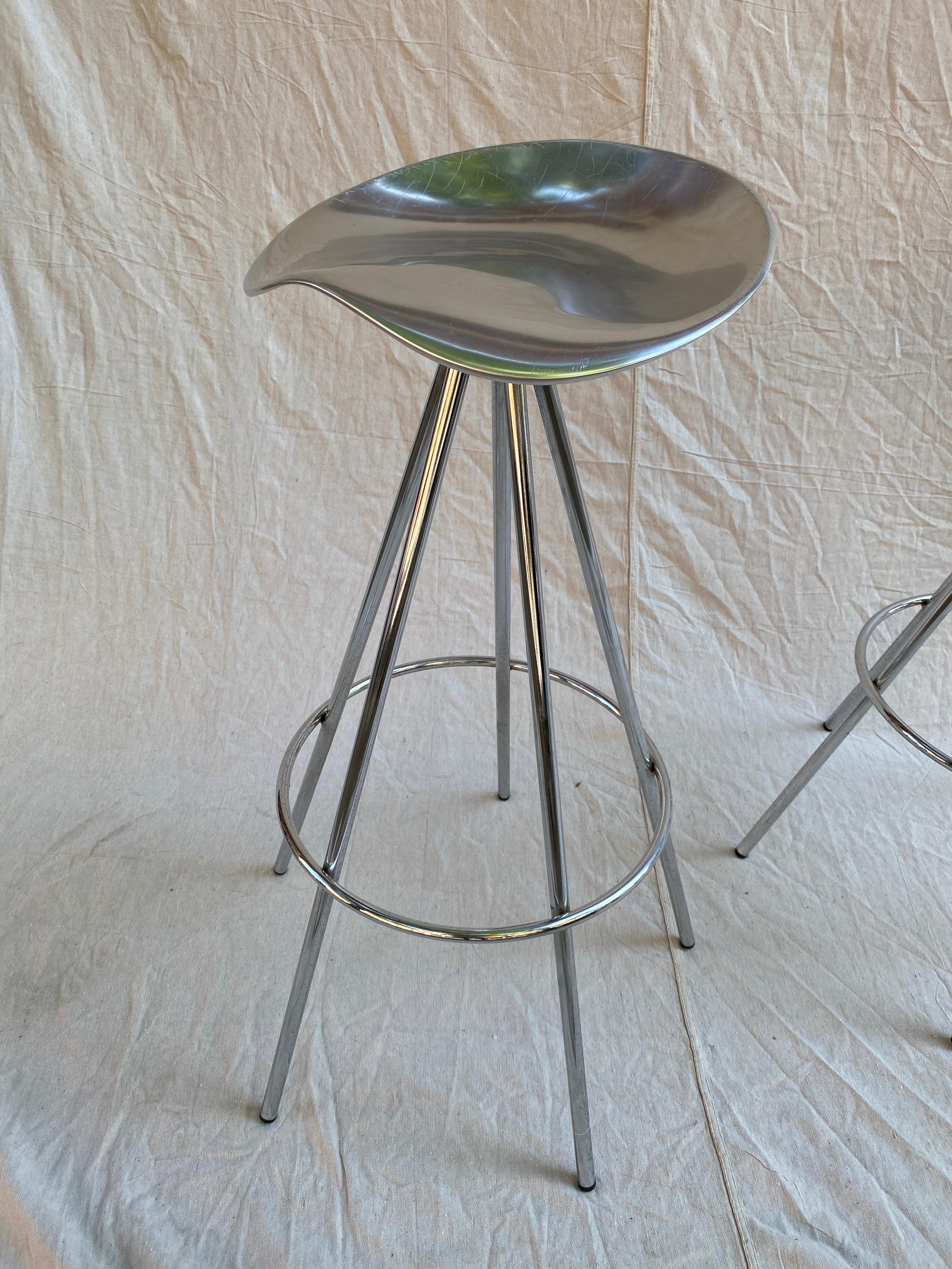 Pair of Jamaica aluminum bar stools designed by Pepe Cortes for Amat. Sold in this country through Knoll. Comfortable swiveling stools, very stabile. Shows some fine scratches to seat areas, but overall presents very well.