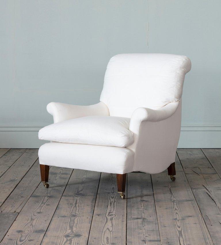 With sack back upholstery and out scrolled arms, the Millicent chair is based on an early 19th century Howard and Sons model. Clients own material, circa 8m of plain fabric required.
 