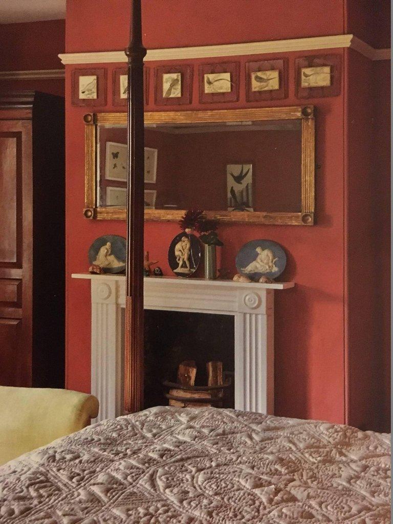 This beautifully proportioned marble fireplace is decorated with fluted frieze and jambs, recessed returns and distinctive roundels or bull’s eyes to the cornerblocks. A quintessential expression of the Regency style, it echoes the work of the