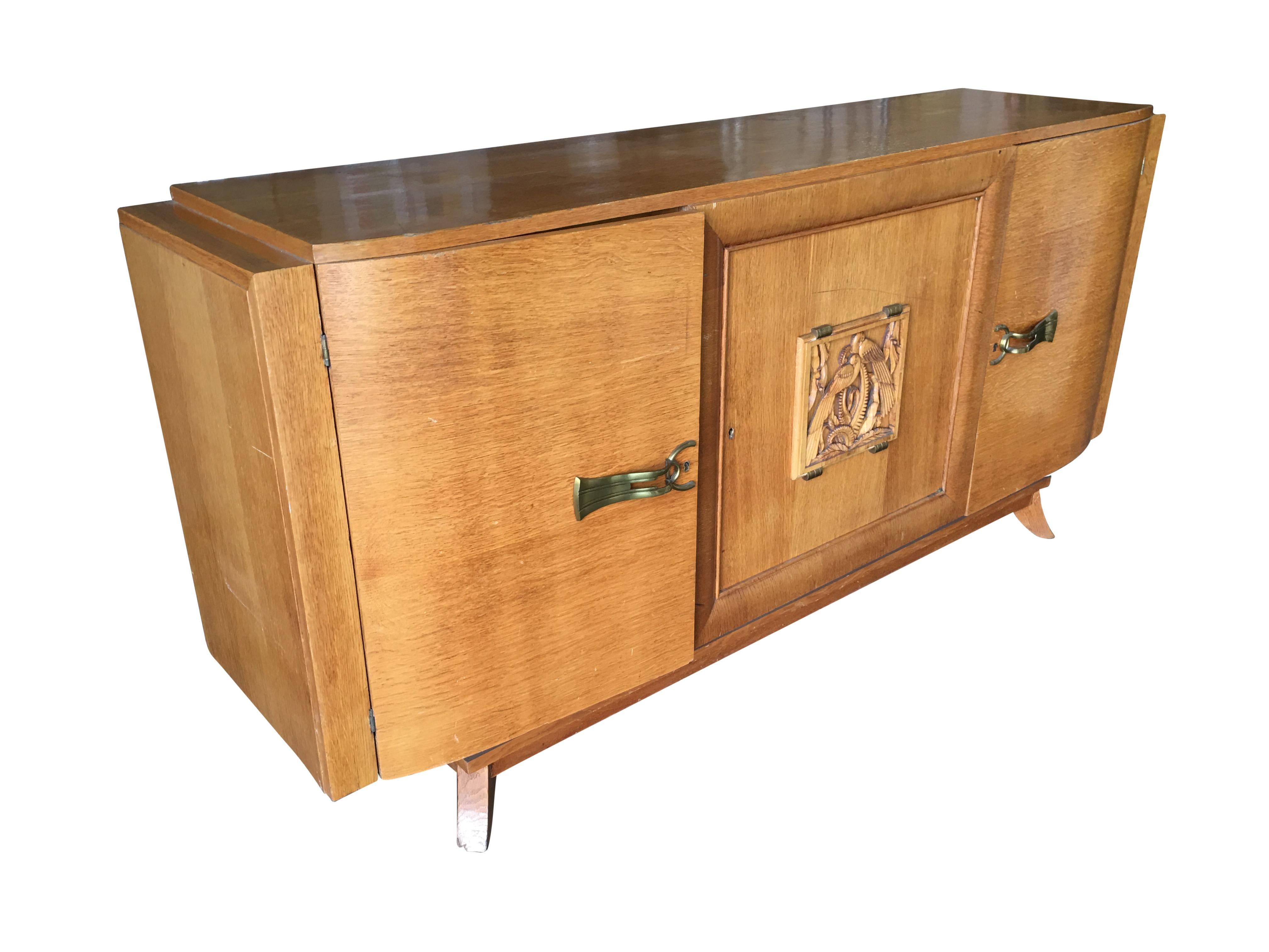 Early James Mont style 1940s midcentury era sideboard with hand carved East Asian art sculpture along the front.
