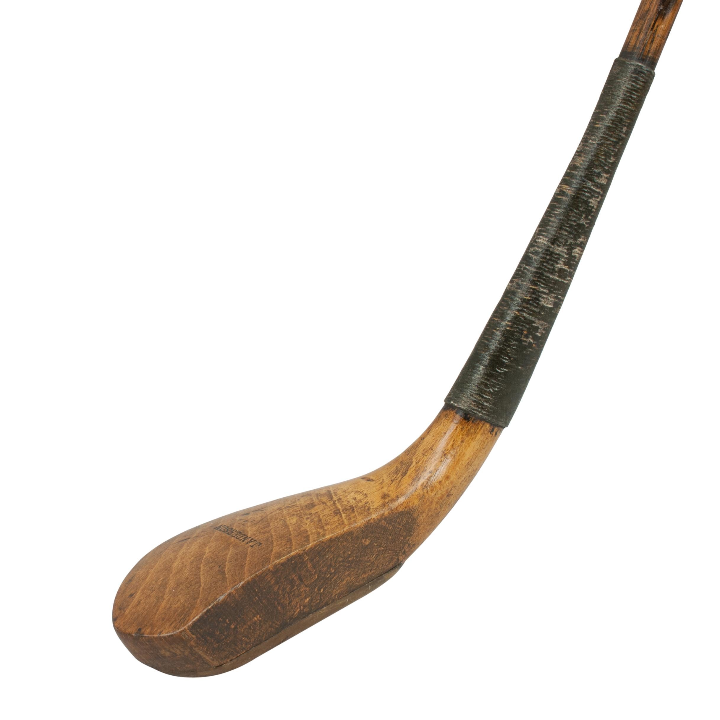 Antique Long Nose Golf Club.
A superb beechwood long nosed golf club by Jamie Anderson of St. Andrews. The polished head with makers stamp, 'J. Anderson', lead weight to the rear and the traditional horn slip along the leading edge of the sole,