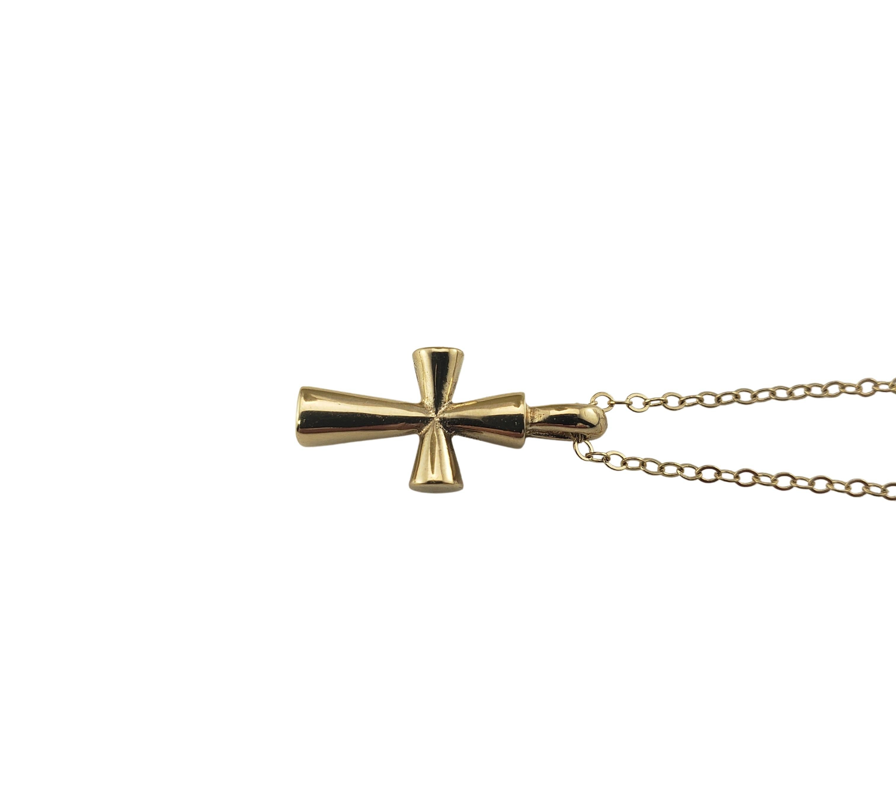 Vintage James Avery 14 Karat Yellow Gold Cross Pendant Necklace-

This lovely cross pendant is crafted in 14K yellow gold and suspends from a classic cable necklace. Chain is NOT James Avery.

Size: 15 inches (necklace)
18 mm x 8 mm (cross)

Weight:
