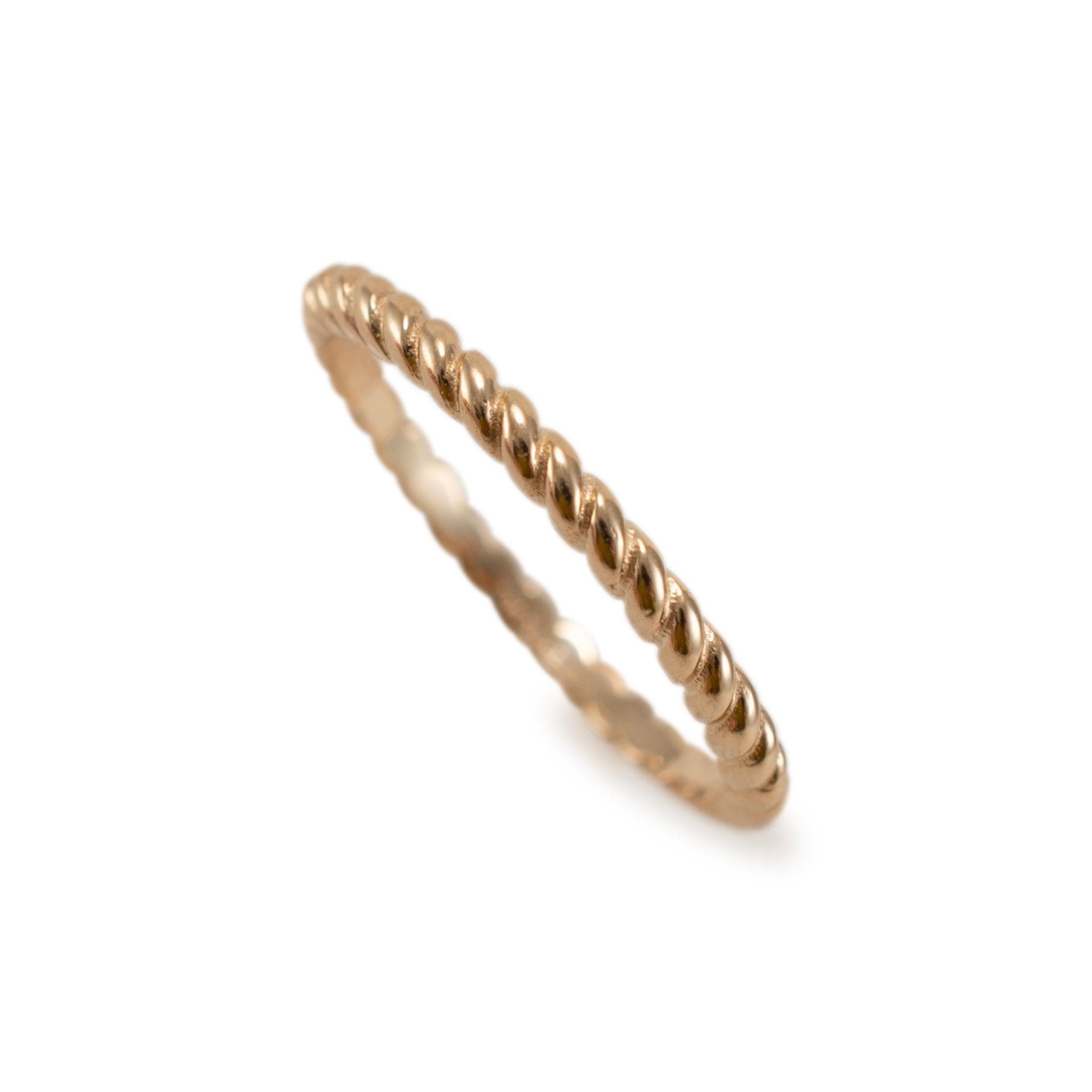 Brand: James Avery

Metal Type: 14K Yellow Gold

Ring Size: 9

Width: 2.00 mm

Weight: 2.32 grams

14K yellow gold twisted band with a comfort-fit shank. The metal was tested and determined to be 14K yellow gold. Engraved with 