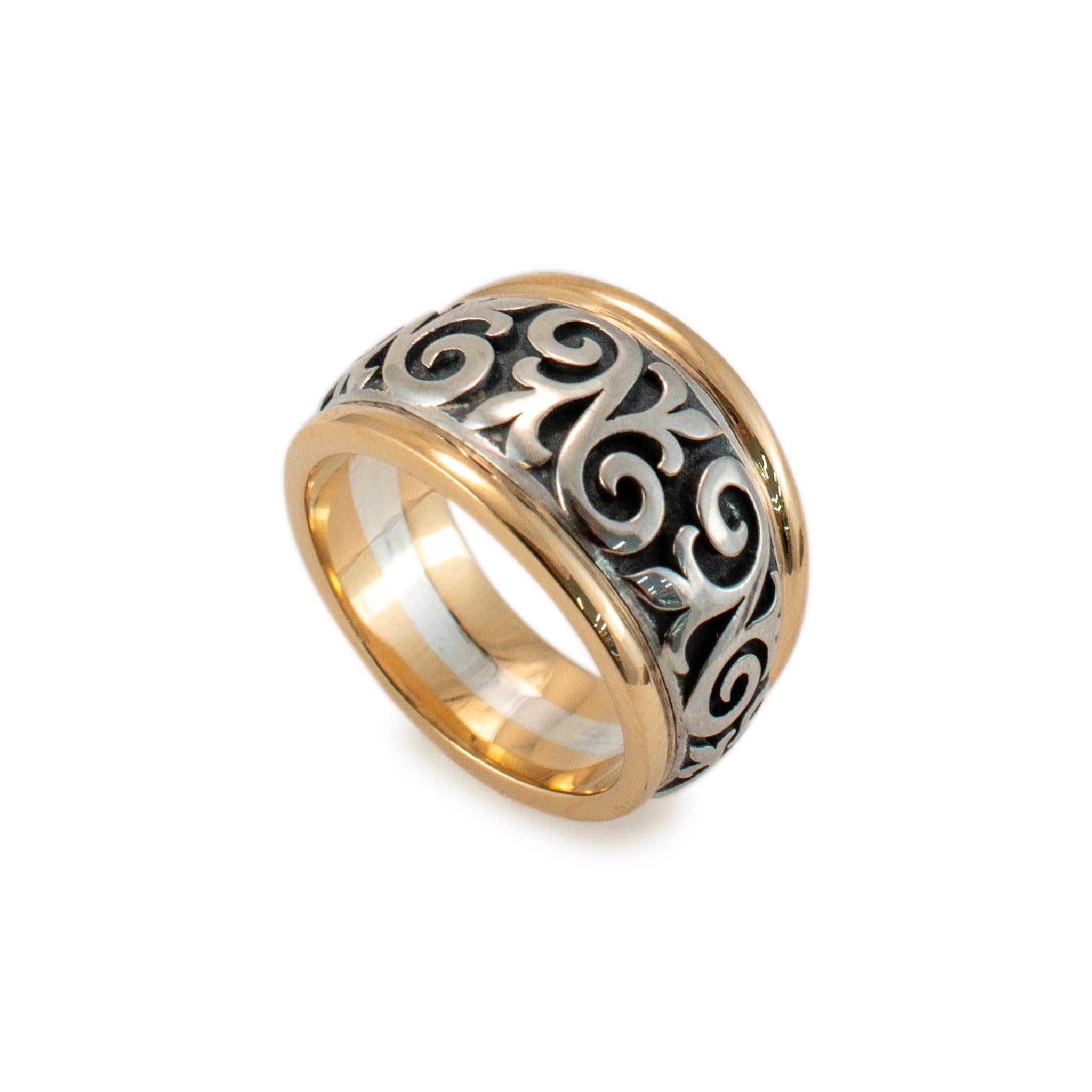 Brand: James Avery

Gender: Unisex

Metal Type: 14K Yellow Gold & 925 Sterling Silver

Size: 8

Width: 13.95 mm tapering to 7.30 mm

Weight: 13.77 Grams

Designer made textured & polished silver and 14K yellow gold ring with a comfort-fit shank. The